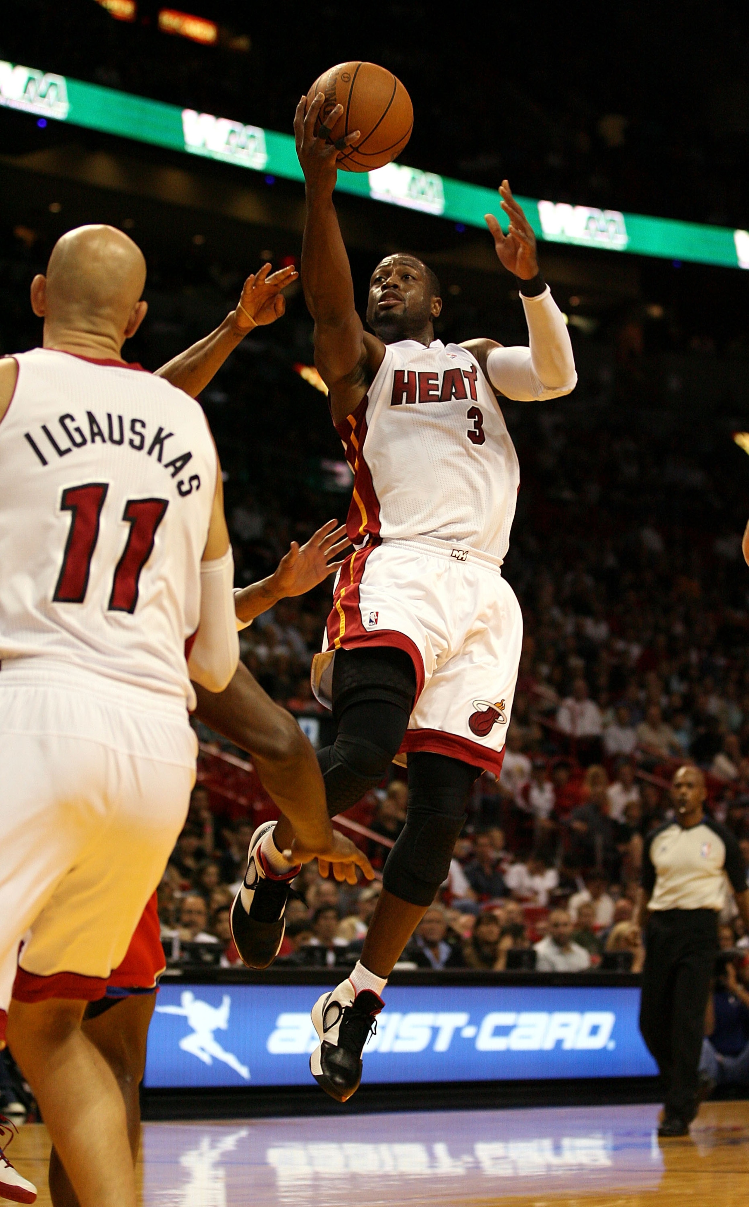 MIAMI - NOVEMBER 26:  Guard Dwyane Wade #3 of the Miami Heat shoots against the Philadelphia 76ers at American Airlines Arena on November 26, 2010 in Miami, Florida.  (Photo by Marc Serota/Getty Images)