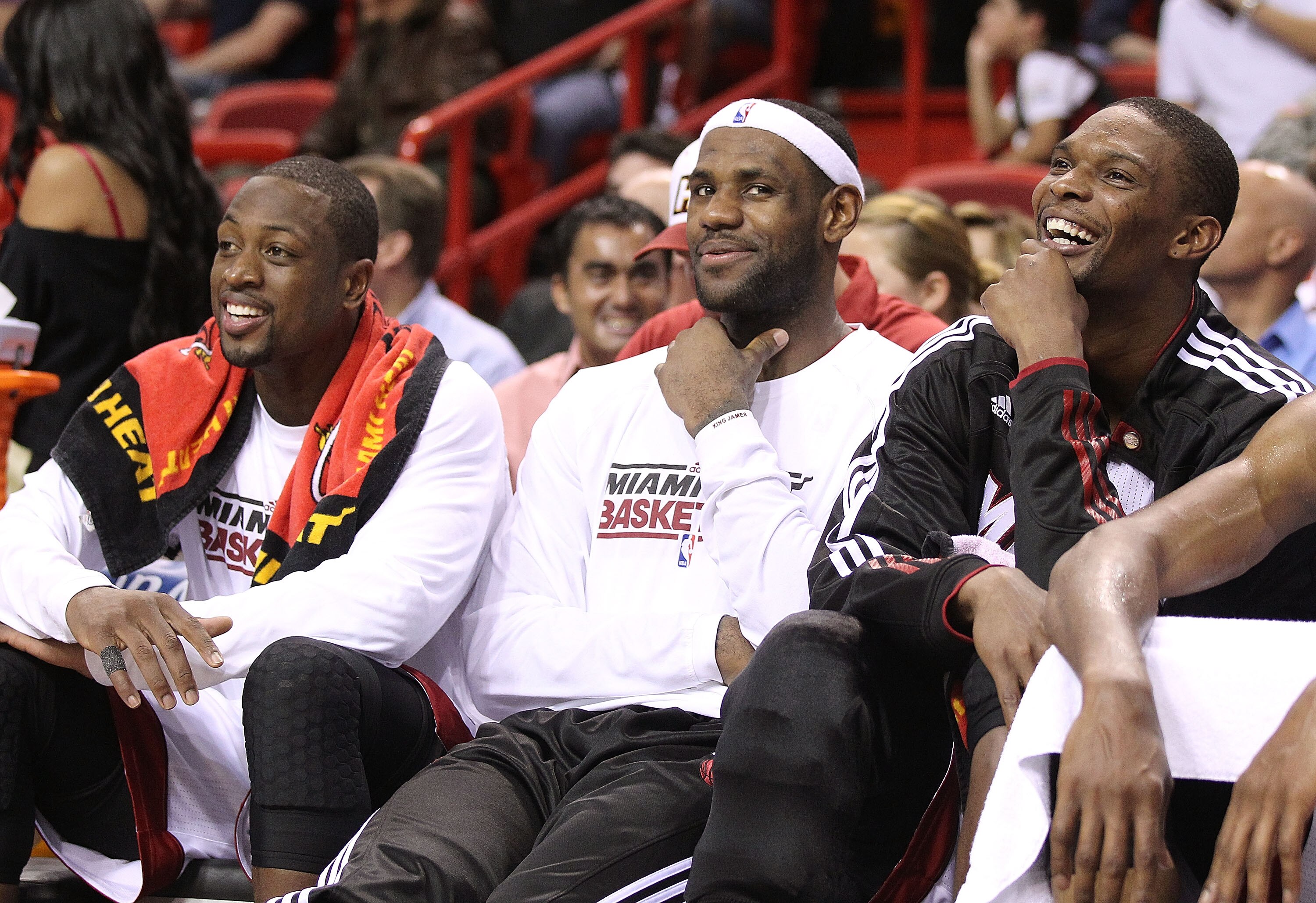 MIAMI - NOVEMBER 17:  LeBron James #6 and Dwyane Wade #3, and Chris Bosh #1 of the Miami Heat laugh on the bench during a game against the Phoenix Suns at American Airlines Arena on November 17, 2010 in Miami, Florida. NOTE TO USER: User expressly acknowl