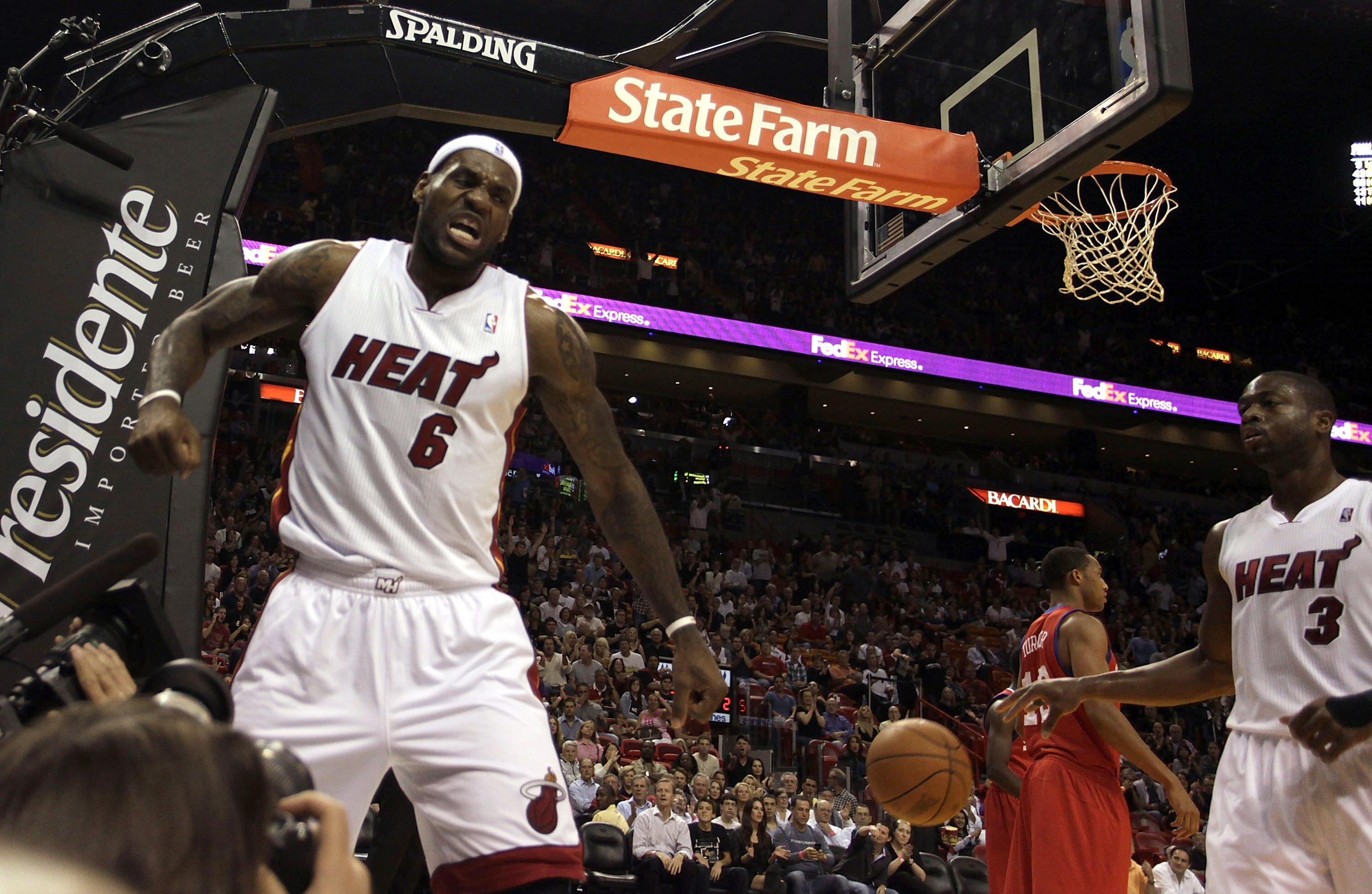 MIAMI - NOVEMBER 26:  Forward LeBron James #6 of the Miami Heat celebrates a dunk against the Philadelphia 76ers at American Airlines Arena on November 26, 2010 in Miami, Florida.  (Photo by Marc Serota/Getty Images)