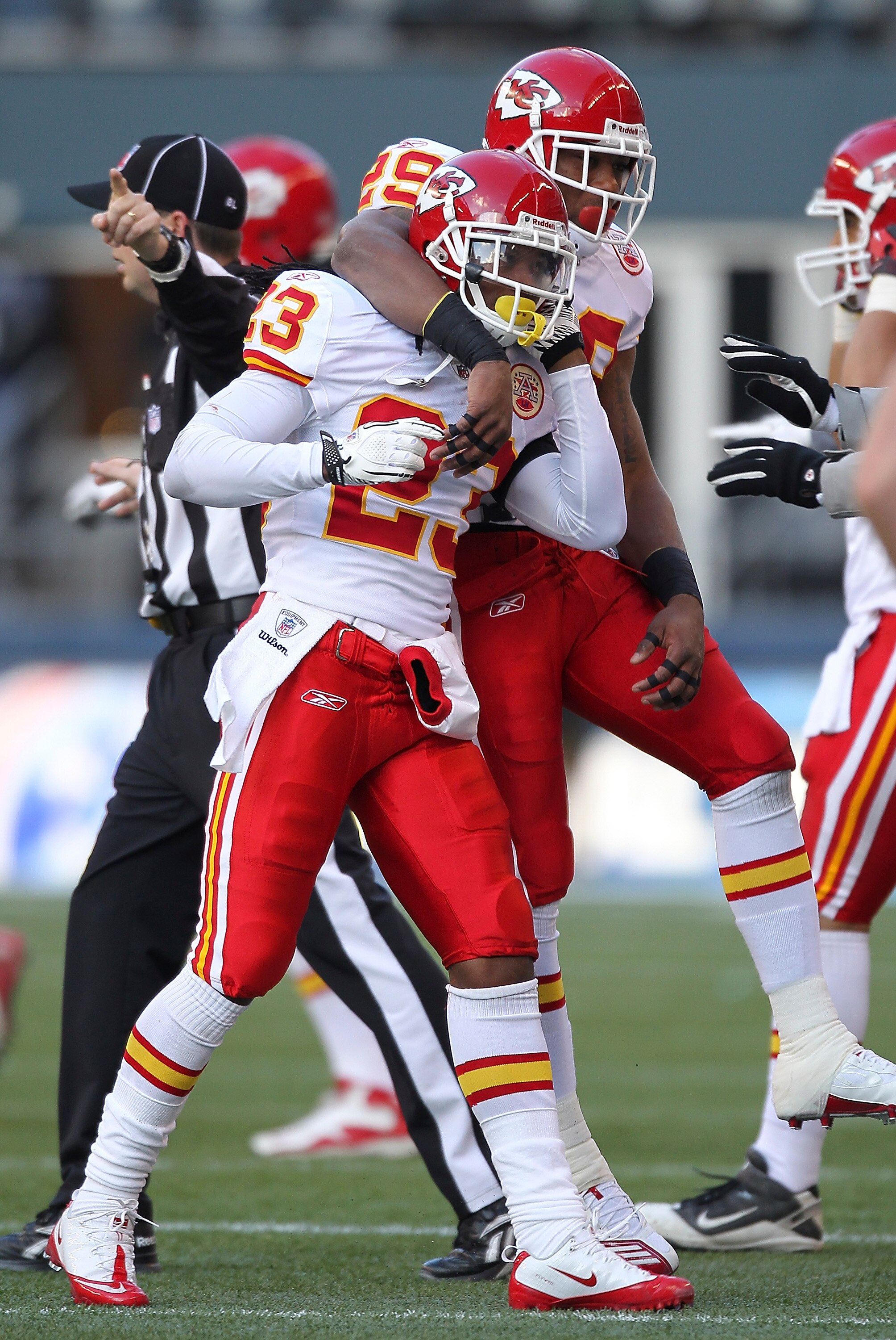 SEATTLE - NOVEMBER 28:  Safety Kendrick Lewis #23 of the Kansas City Chiefs is congratulated by Eric Berry #29 after intercepting a pass against the Seattle Seahawks at Qwest Field on November 28, 2010 in Seattle, Washington. The Chiefs defeated the Seaha