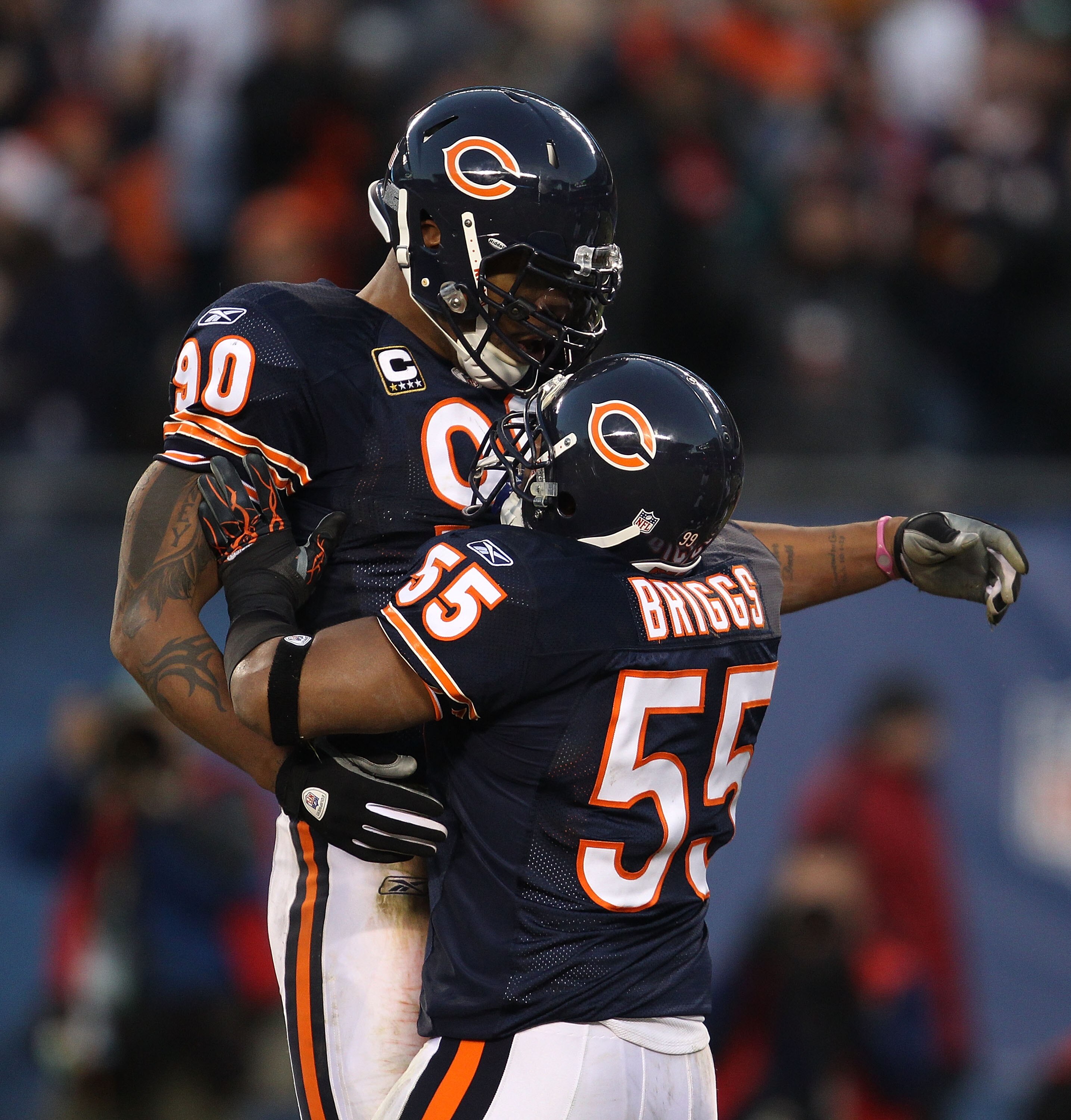 CHICAGO - NOVEMBER 28: Lance Briggs #55 of the Chicago Bears celebrates a sack by Julius Peppers #90 against the Philadelphia Eagles at Soldier Field on November 28, 2010 in Chicago, Illinois. (Photo by Jonathan Daniel/Getty Images)
