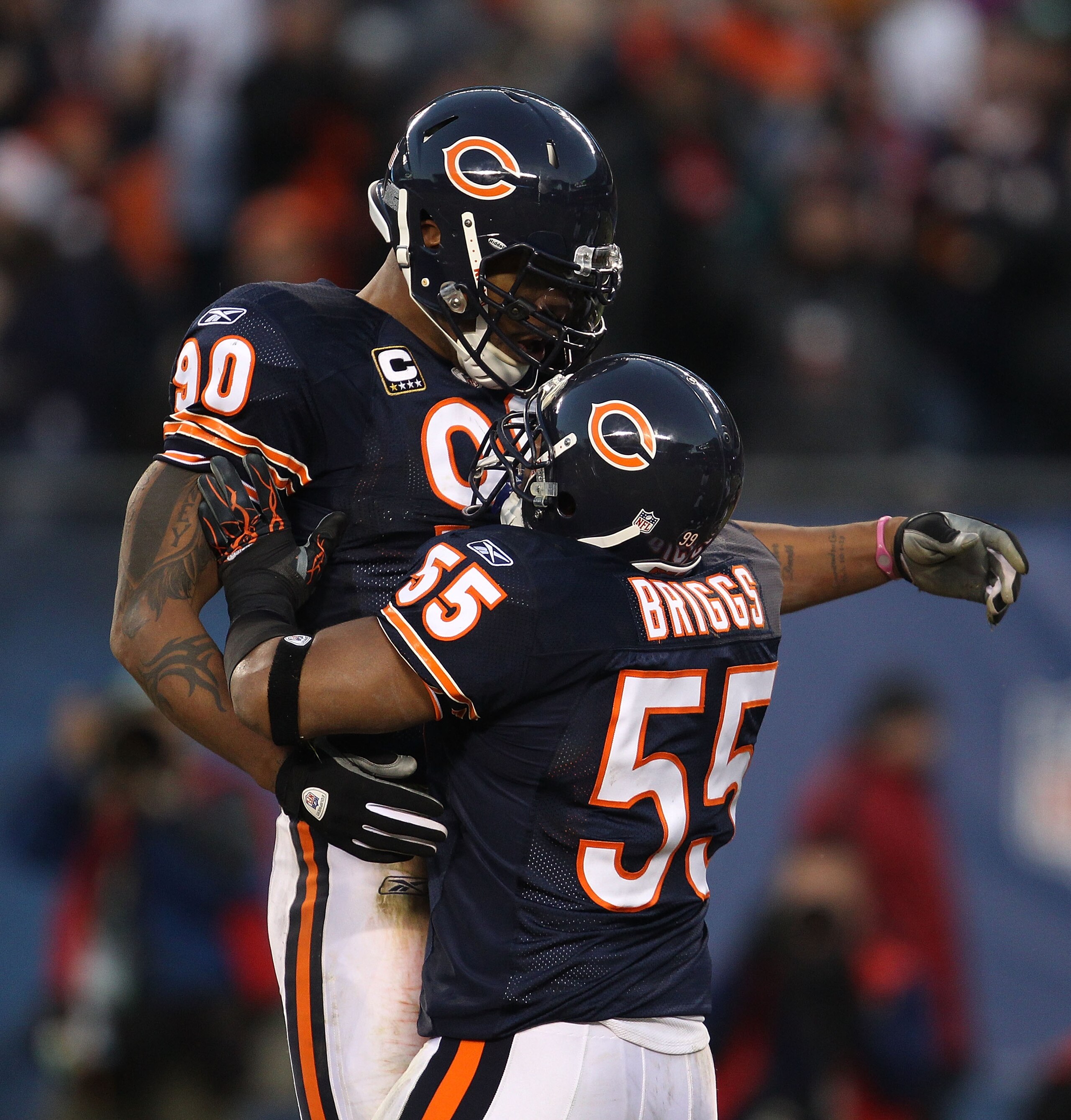 CHICAGO - NOVEMBER 28: Lance Briggs #55 of the Chicago Bears celebrates a sack by Julius Peppers #90 against the Philadelphia Eagles at Soldier Field on November 28, 2010 in Chicago, Illinois. (Photo by Jonathan Daniel/Getty Images)