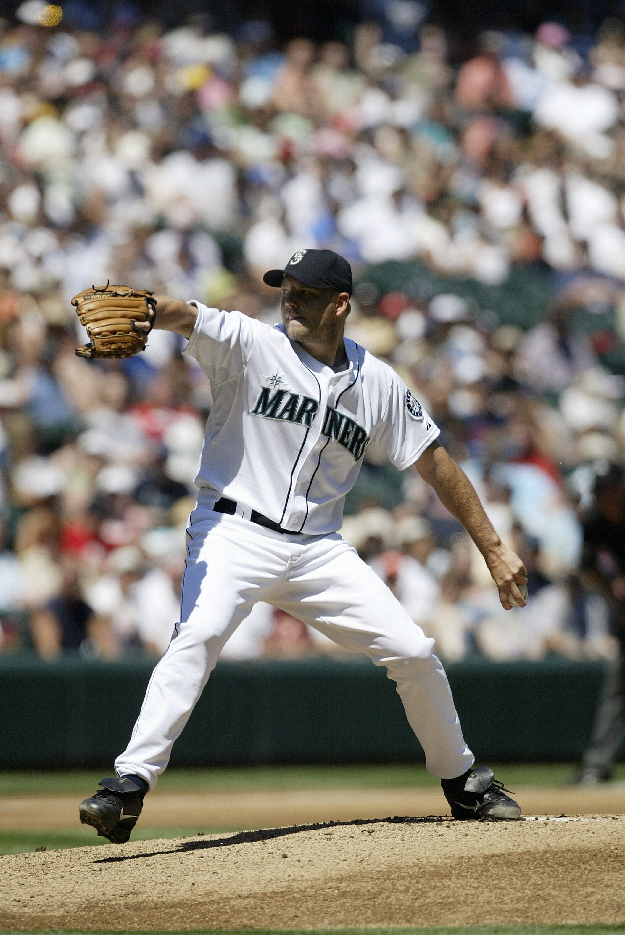 SEATTLE - JULY 23:  Jarrod Washburn #56 of the Seattle Mariners pitches against the Boston Red Sox on July 23, 2006 at Safeco Field in Seattle, Washington. The Mariners defeated the Red Sox 9-8. (Photo by Otto Greule Jr/Getty Images)