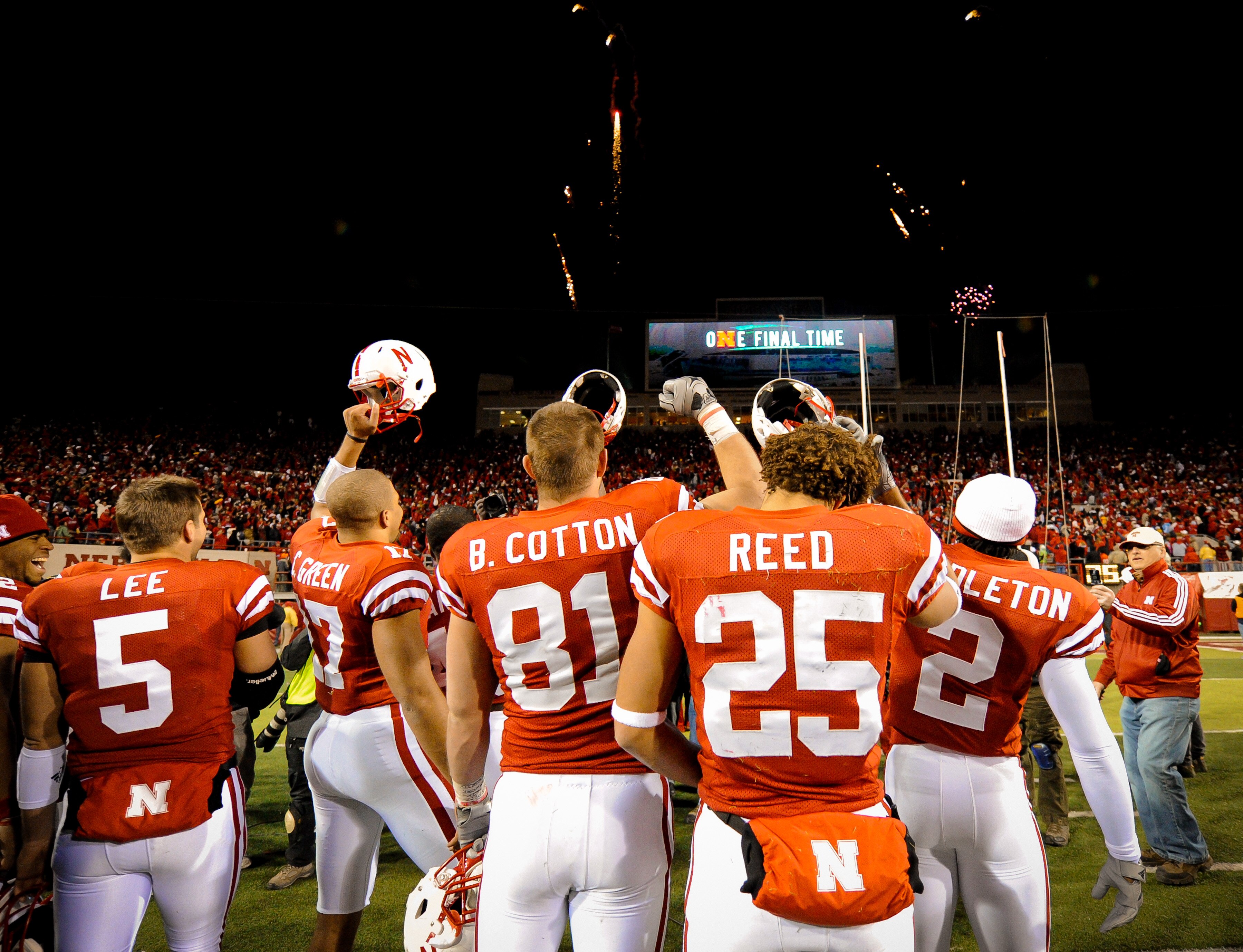 LINCOLN, NE - NOVEMBER 26: Members of the Nebraska Cornhuskers celebrate their Big 12 North chamionship after their game at Memorial Stadium on November 26, 2010 in Lincoln, Nebraska. Nebraska defeated Colorado 45-17. (Photo by Eric Francis/Getty Images)