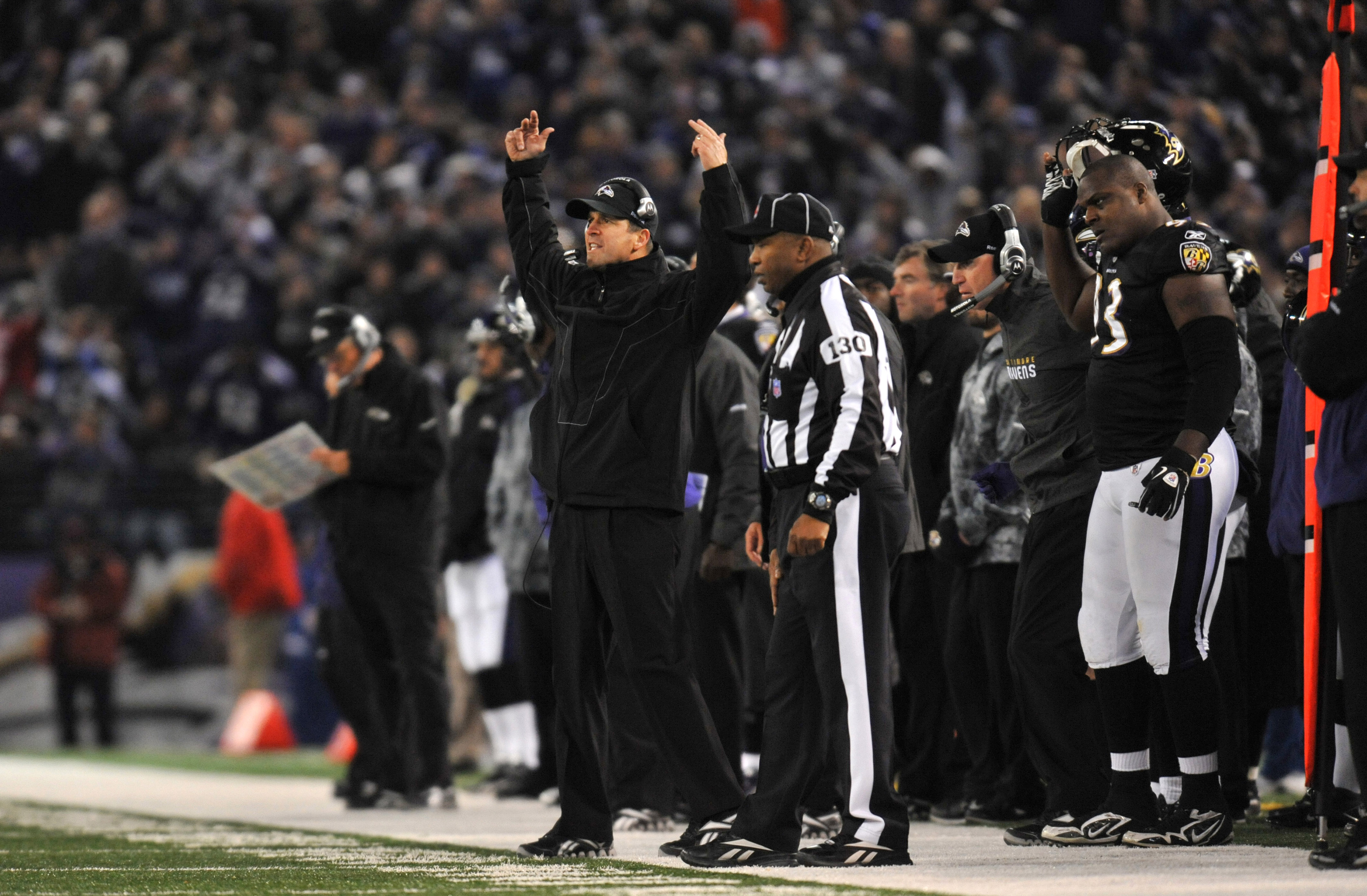 BALTIMORE, MD - NOVEMBER 28:  Head coach John Harbaugh of the Baltimore Ravens cheers on his team during the game against the Tampa Bay Buccaneers at M&T Bank Stadium on November 28, 2010 in Baltimore, Maryland. The Ravens defeated the Buccaneers 17-10. (
