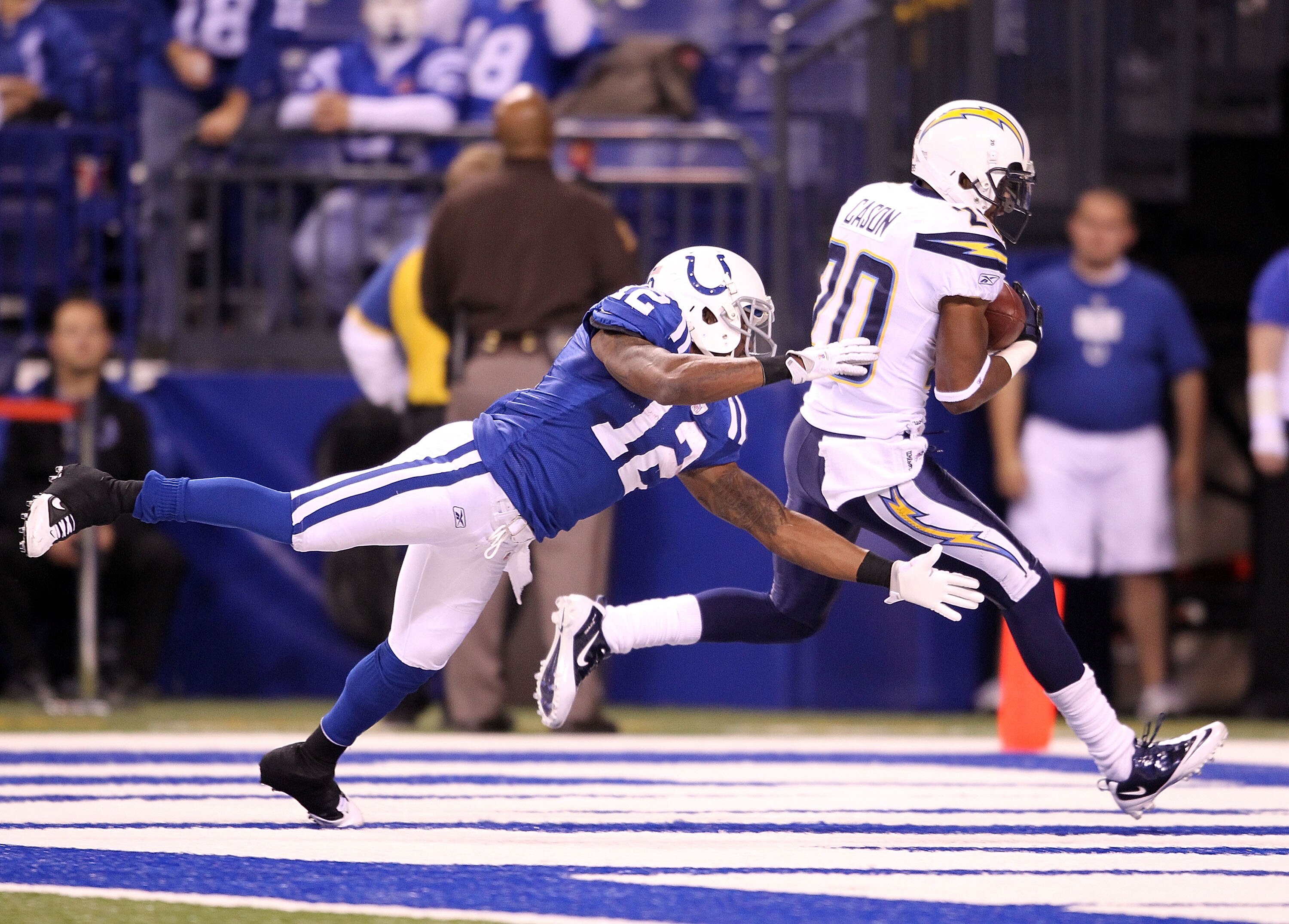 INDIANAPOLIS - NOVEMBER 28: Antoine Cason #20 of the San Diego Chargers intercepts a pass during the NFL game against the Indianapolis Colts at Lucas Oil Stadium on November 28, 2010 in Indianapolis, Indiana. The Chargers won 36-14.(Photo by Andy Lyons/Ge