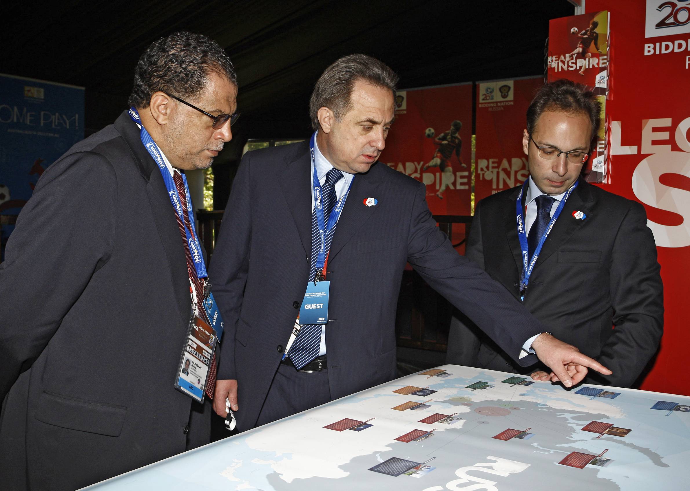 CAPE TOWN, SOUTH AFRICA - DECEMBER 4:  In this handout image provided by the 2010 FIFA World Cup Organising Committee South Africa, Vitaly Mutko (Russia Sports Minister) shows 2010 FIFA World Cup South OC CEO Danny Jordaan the Russian Bid Cities on a map