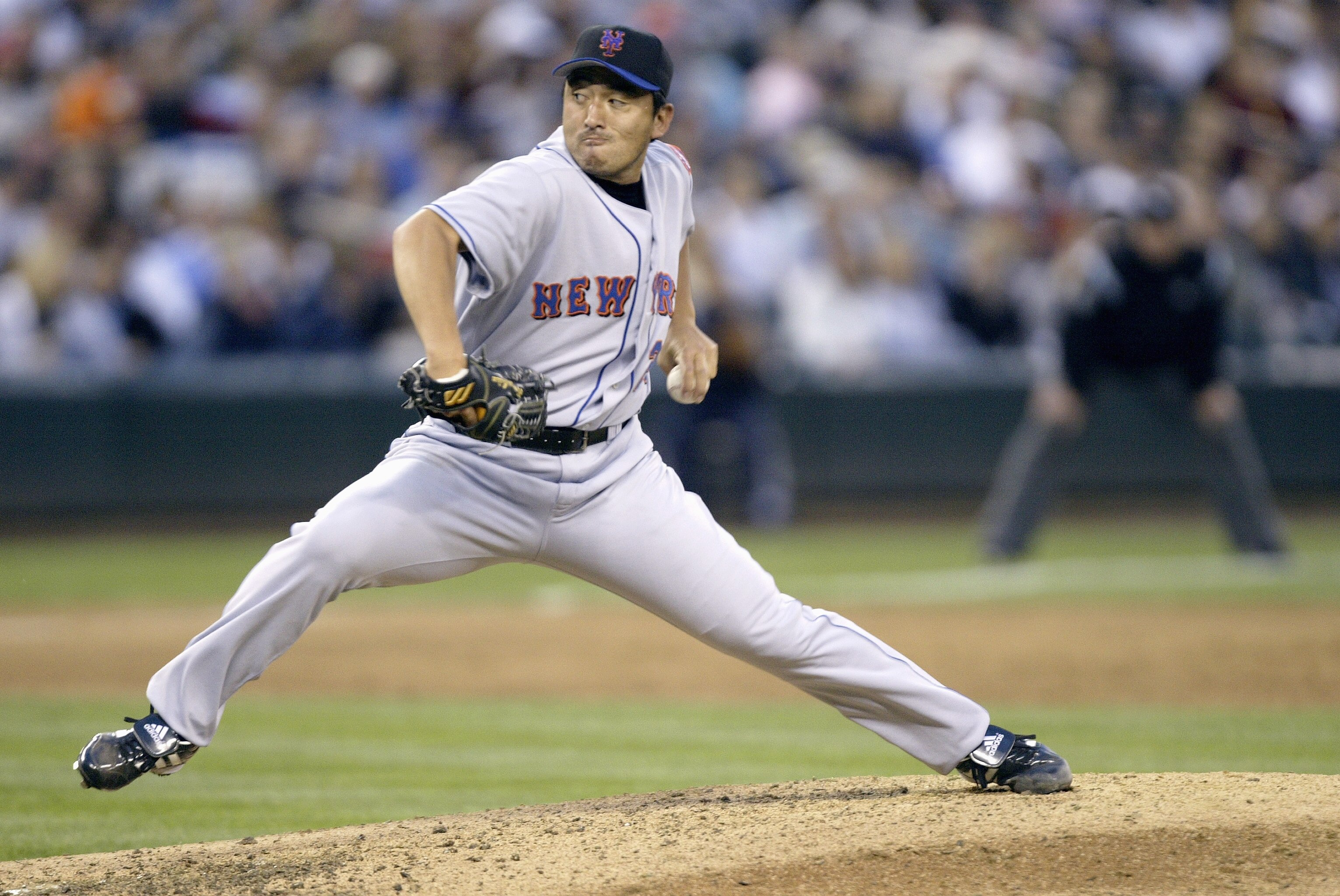 SEATTLE - JUNE 17:  Kazuhisa Ishii #25 of the New York Mets pitches during the game with the Seattle Mariners on June 17 2005 at Safeco Field in Seattle Washington. The Mariners won 5-0. (Photo by Otto Greule Jr/Getty Images)