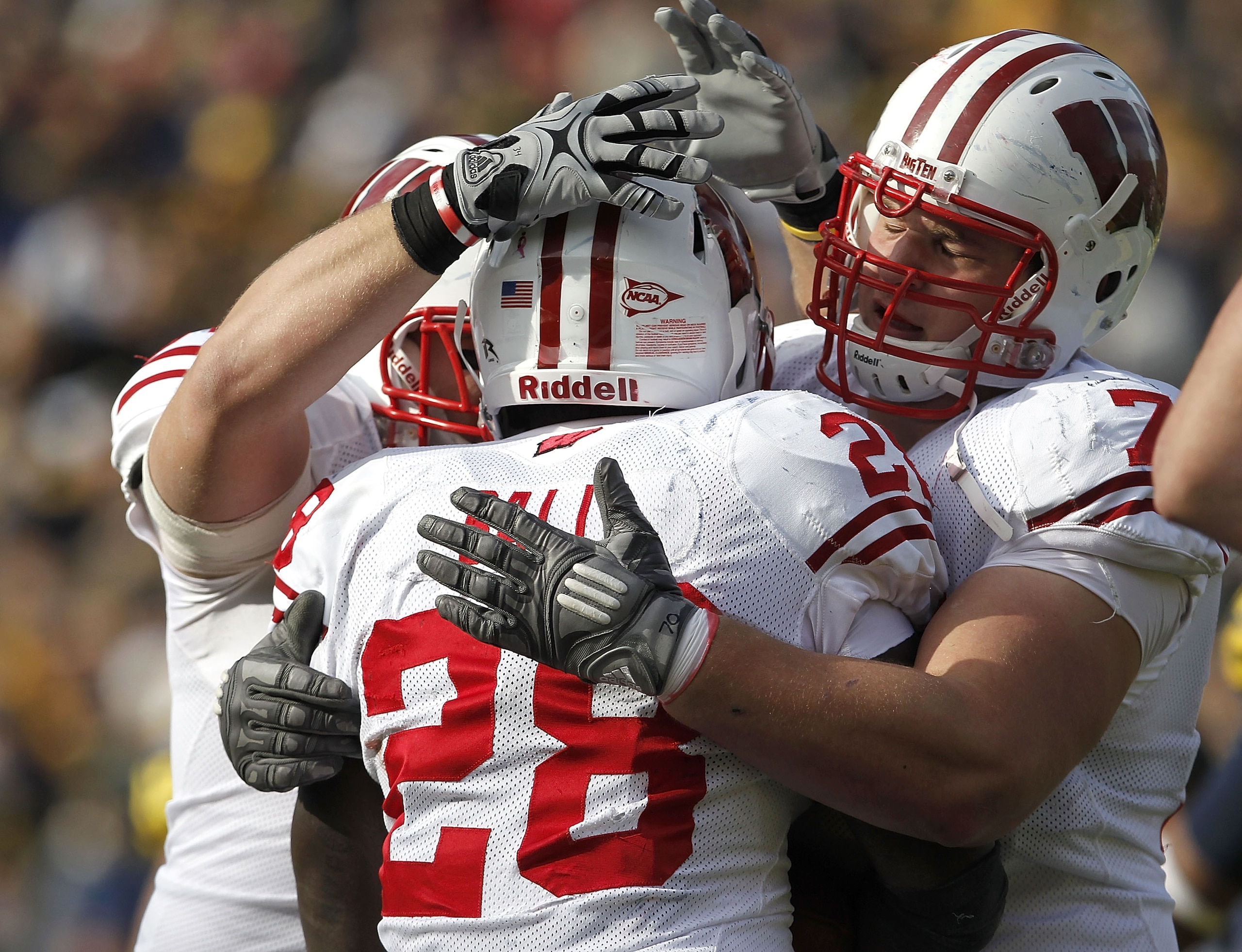 ANN ARBOR, MI - NOVEMBER 20:  Montee Ball #28 of the Wisconsin Badgers celebrates a second quarter touchdown with teammate Kevin Zeitler #70 while playing the Michigan Wolverines at Michigan Stadium on November 20, 2010 in Ann Arbor, Michigan.  (Photo by