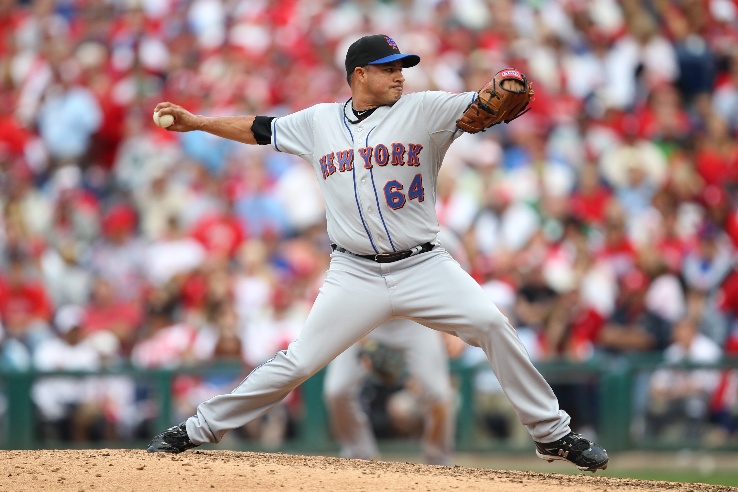 PHILADELPHIA - SEPTEMBER 26: Relief pitcher Elmer Dessens #64 of the New York Mets throws a pitch during a game against the Philadelphia Phillies at Citizens Bank Park on September 26, 2010 in Philadelphia, Pennsylvania. The Mets won 7-3. (Photo by Hunter