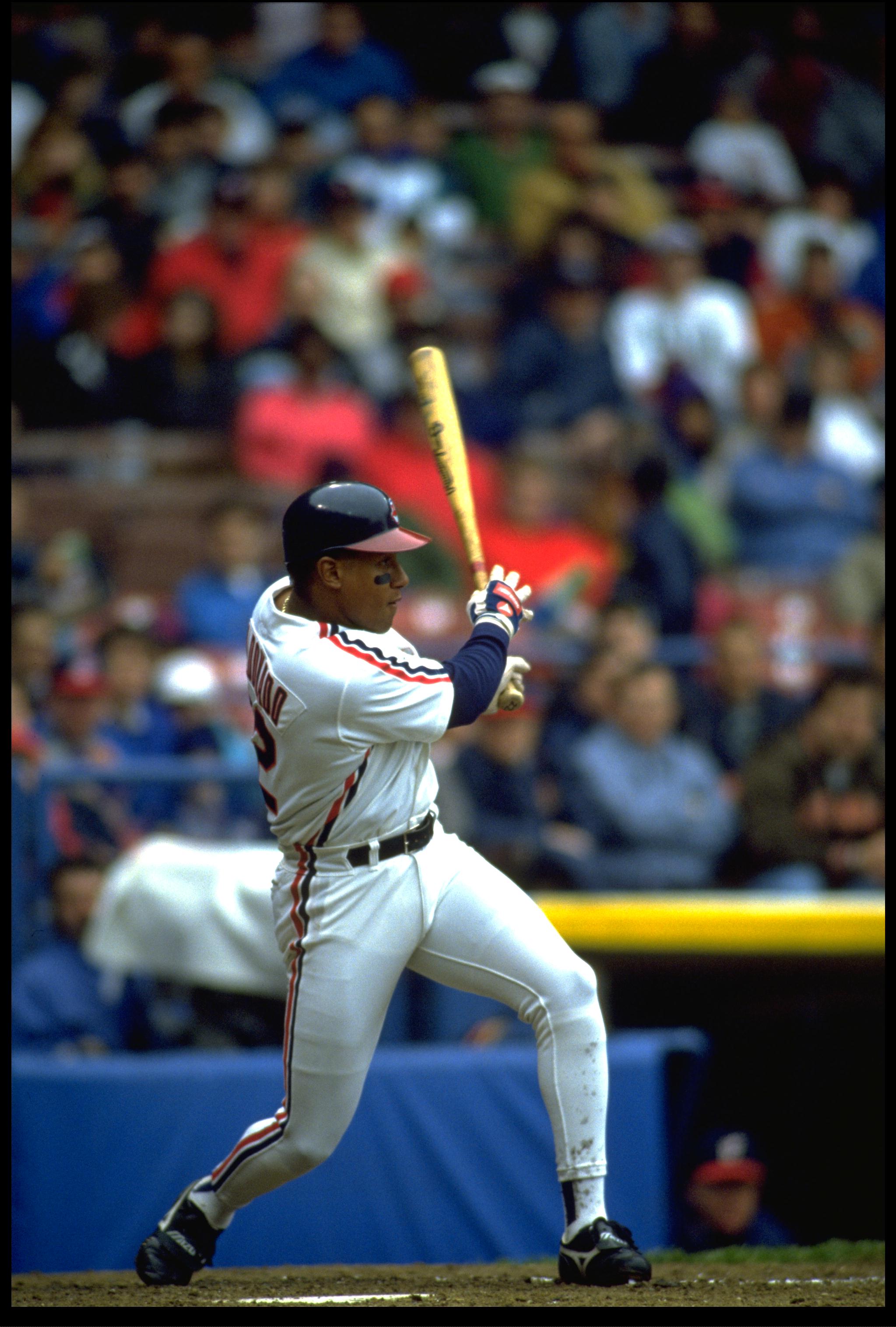 CLEVELAND INDIANS INFIELDER CANDY MALDONADO MAKES CONTACT WITH A PITCH DURING THE INDIANS GAME AT INDIANS PARK IN CLEVELAND, OHIO