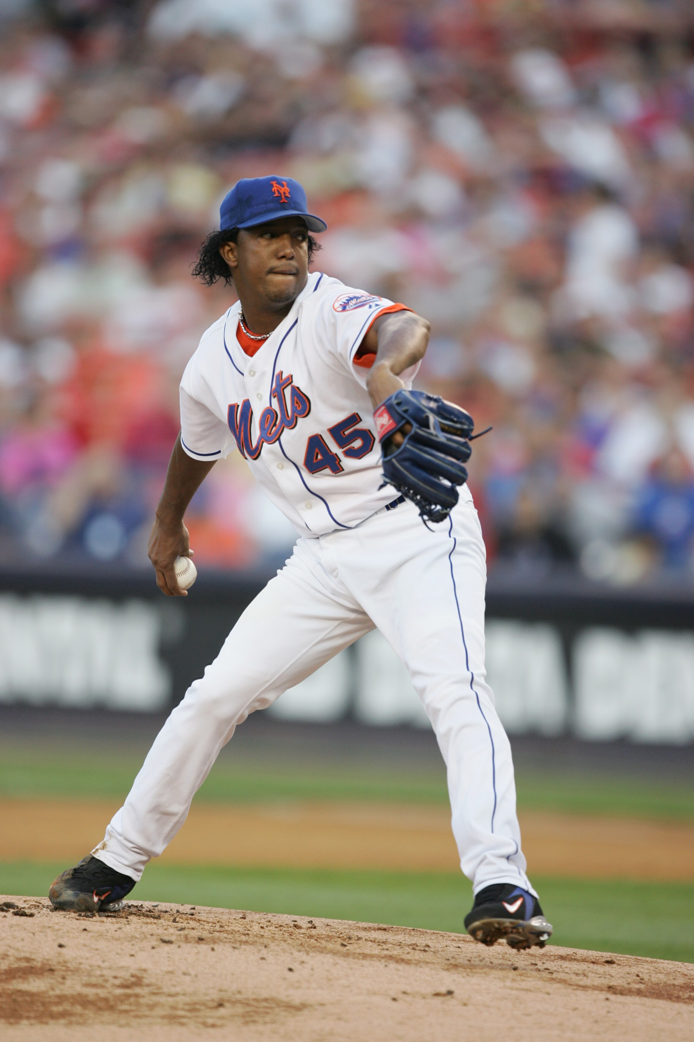 NEW YORK - AUGUST 3:  Pedro Martinez #45 of the New York Mets pitches against the Milwaukee Brewers during their game on August 3, 2005 at Shea Stadium in Flushing, New York. The Brewers defeated the Mets 6-4. (Photo by Al Bello/Getty Images)