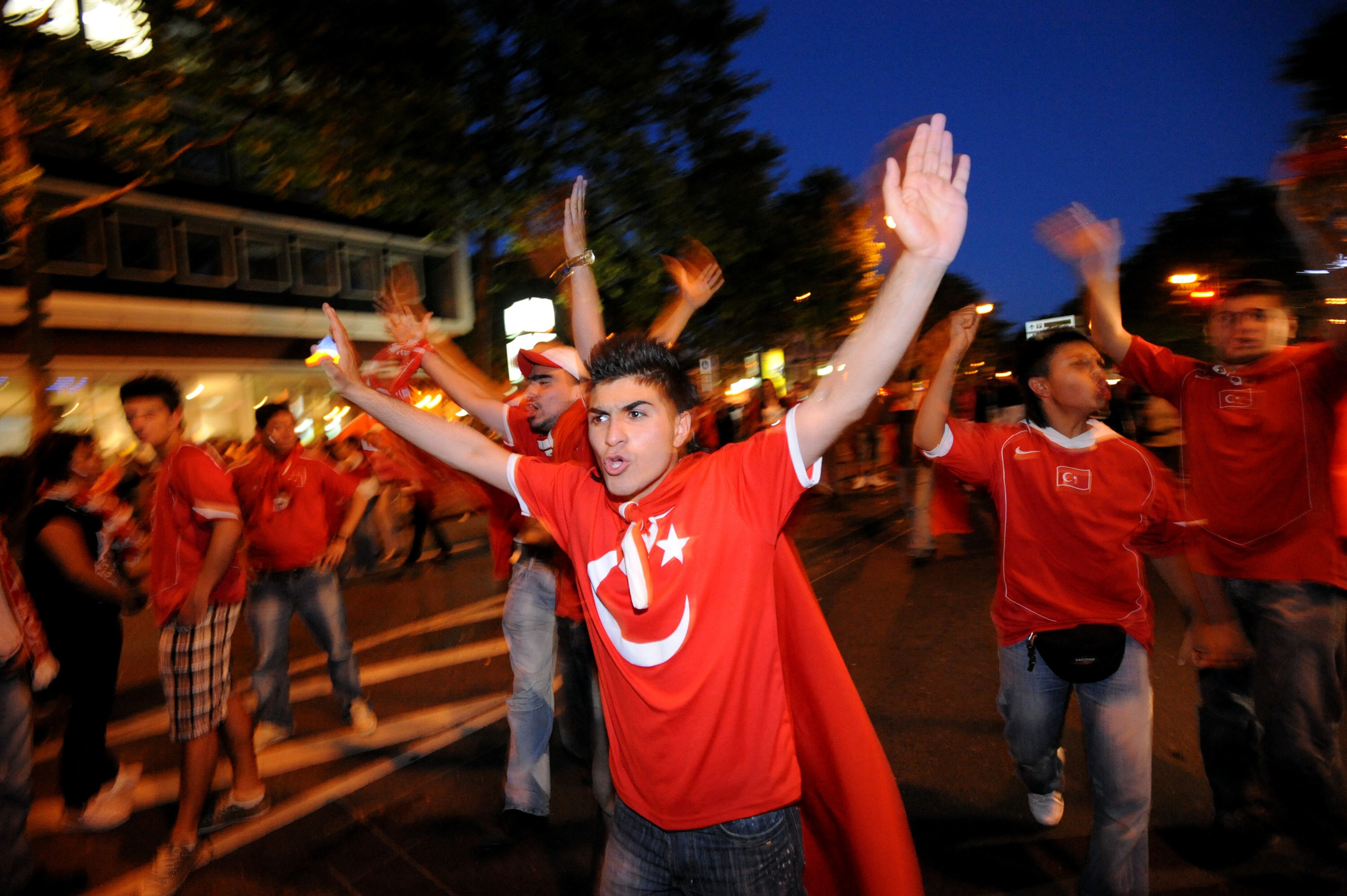 COLOGNE, GERMANY- JUNE 25:  Turkish supporters react after they watched the UEFA EURO 2008 semi final match between Germany and Turkey at the KoelnArena on June 25, 2008 in Cologne, Germany.  (Photo by Burak Kara/Getty Images)