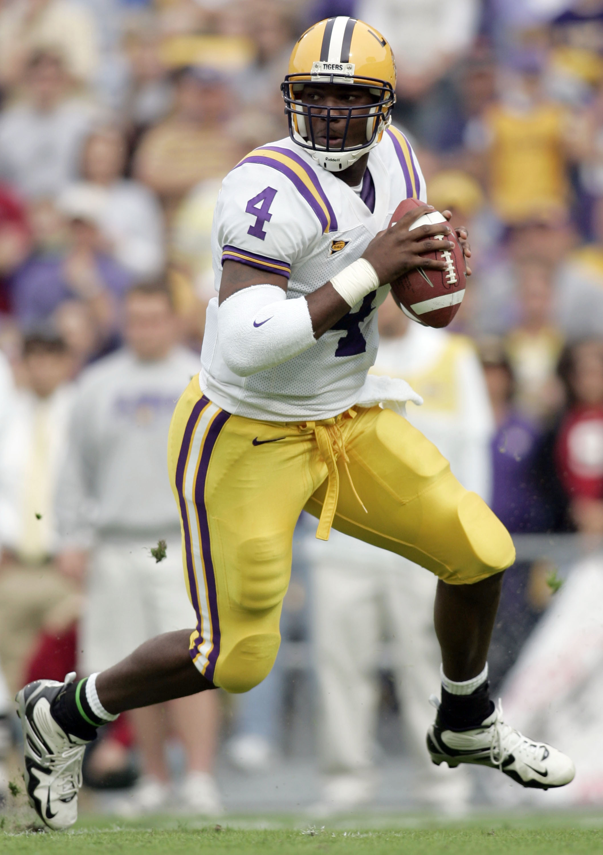 BATON ROUGE, LA - NOVEMBER 25:  Quarterback JaMarcus Russell #4 of the LSU Tigers scrambles against the Arkansas Razorbacks on November 25, 2005 at Tiger Stadium in Baton Rouge, Louisiana. LSU defeated Arkansas 19-17.  (Photo by Chris Graythen/Getty Image