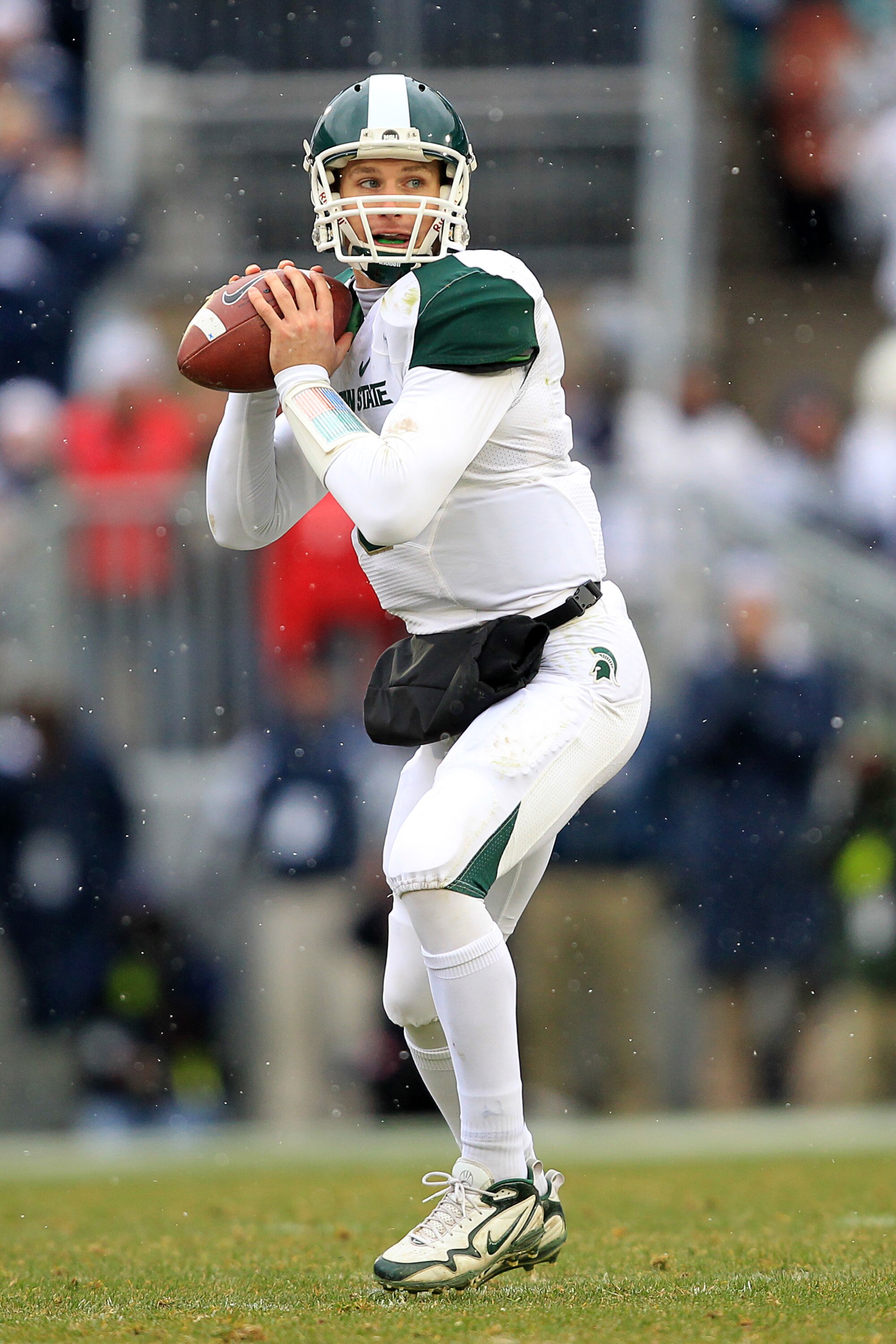 STATE COLLEGE, PA - NOVEMBER 27: Quarterback Kirk Cousins #8 of the Michigan State Spartans looks to pass during a game against the Penn State Nittany Lions on November 27, 2010 at Beaver Stadium in State College, Pennsylvania. The Spartans won 28-22. (Ph
