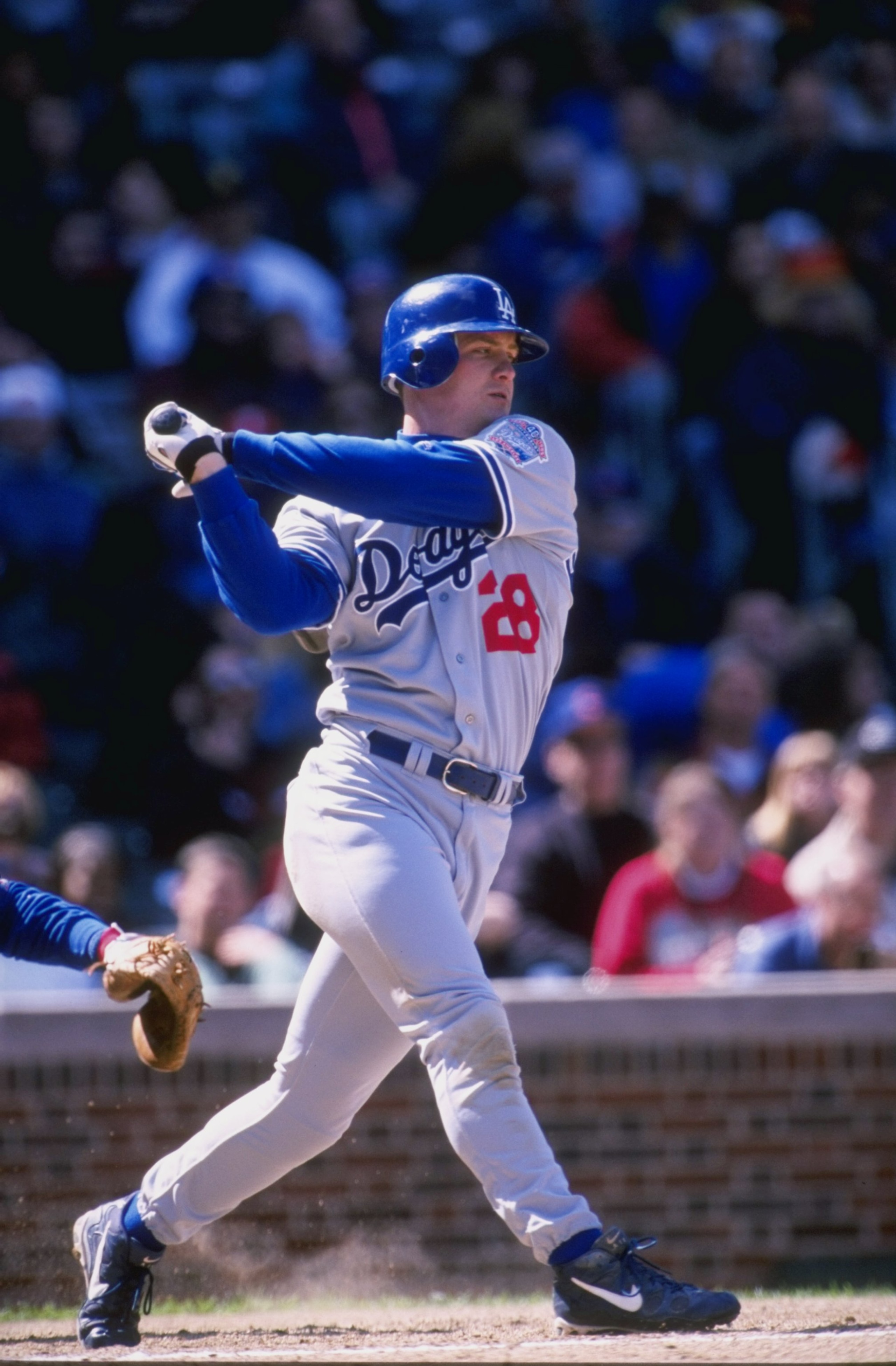 17 Apr 1998: Outfielder Todd Hollandsworth of the Los Angeles Dodgers in action during a game against the Chicago Cubs at Wrigley Field in Chicago, Illinois. The Dodgers defeated the Cubs 10-3. Mandatory Credit: Harry How /Allsport 17 Apr 1998: Outfielder Todd Hollandsworth of the Los Angeles Dodgers in action during a game against the Chicago Cubs at Wrigley Field in Chicago, Illinois. The Dodgers defeated the Cubs 10-3. Mandatory Credit: Harry How /Allsport