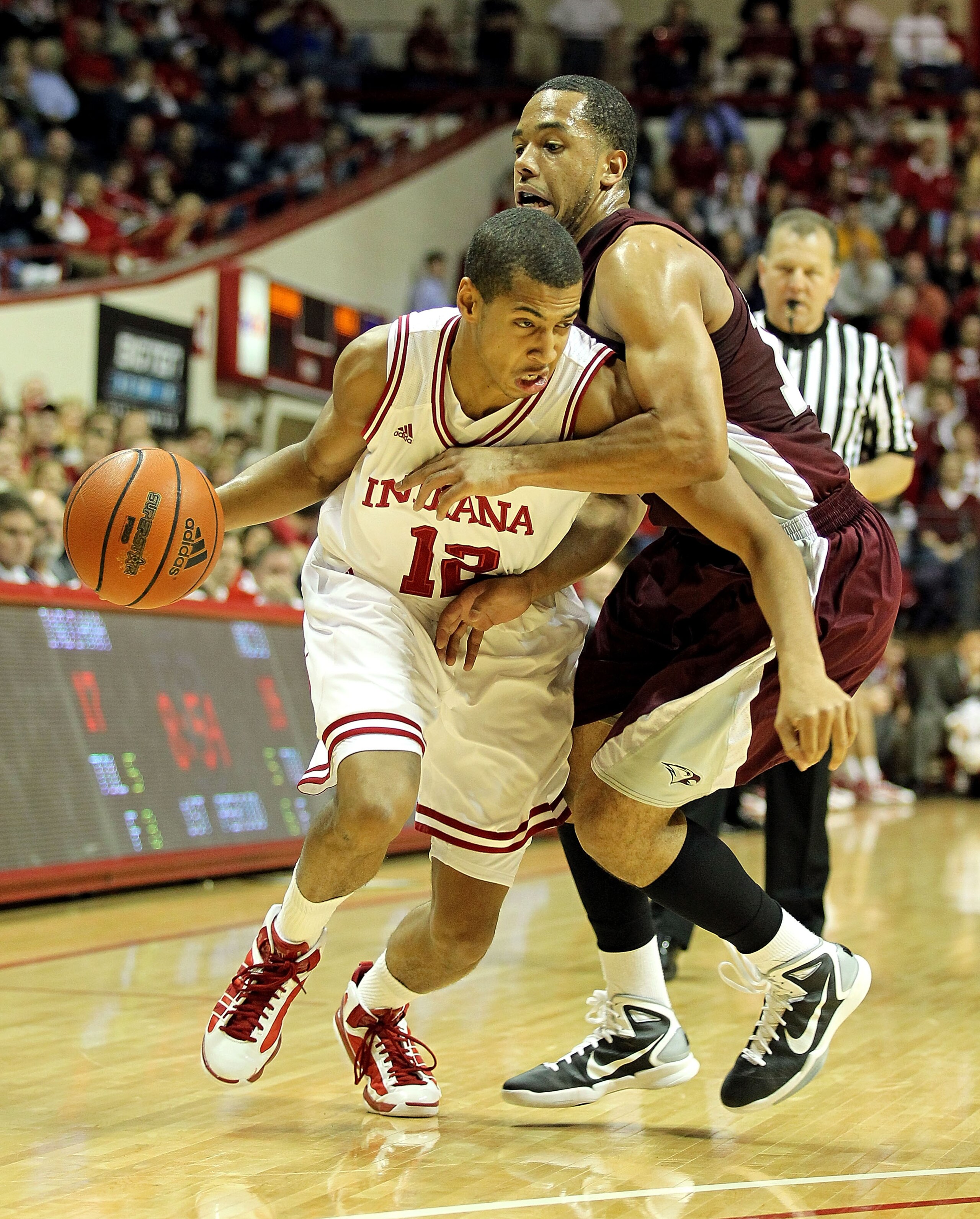 BLOOMINGTON, IN - NOVEMBER 23: Verdell Jones #12 of the Indiana Hoosiers dribbles the ball while defended by Connell Wilkerson #12 of the North Carolina Central Eagles at Assembly Hall on November 23, 2010 in Bloomington, Indiana. Indiana won 72-56. (Ph BLOOMINGTON, IN - NOVEMBER 23: Verdell Jones #12 of the Indiana Hoosiers dribbles the ball while defended by Connell Wilkerson #12 of the North Carolina Central Eagles at Assembly Hall on November 23, 2010 in Bloomington, Indiana. Indiana won 72-56. (Ph