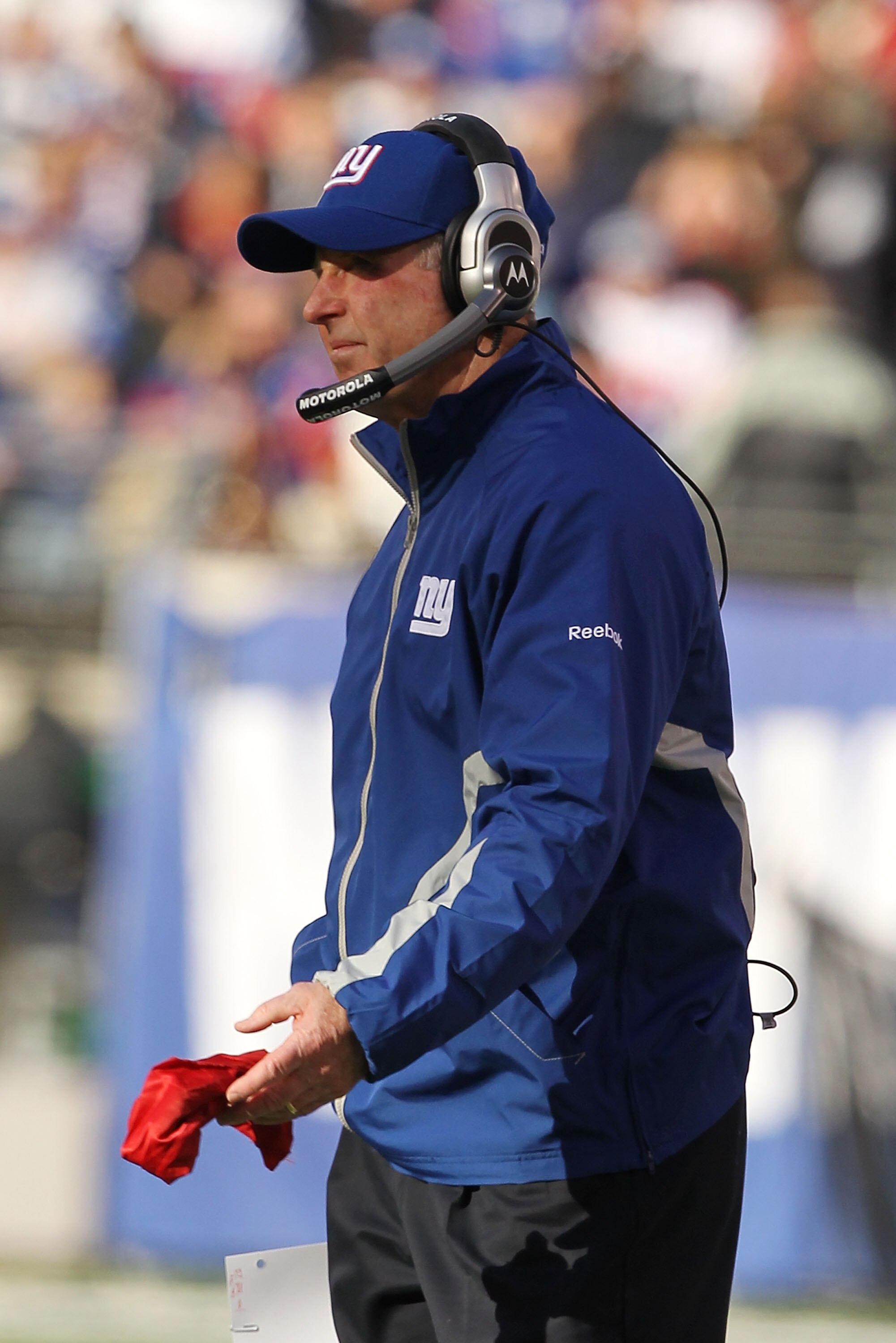 EAST RUTHERFORD, NJ - NOVEMBER 28:  New York Giants Head Coach Tom Coughlin throws the red challenge flag in the first quarter against the Jacksonville Jaguars on November 28, 2010 at The New Meadowlands Stadium in East Rutherford, New Jersey.  (Photo by 