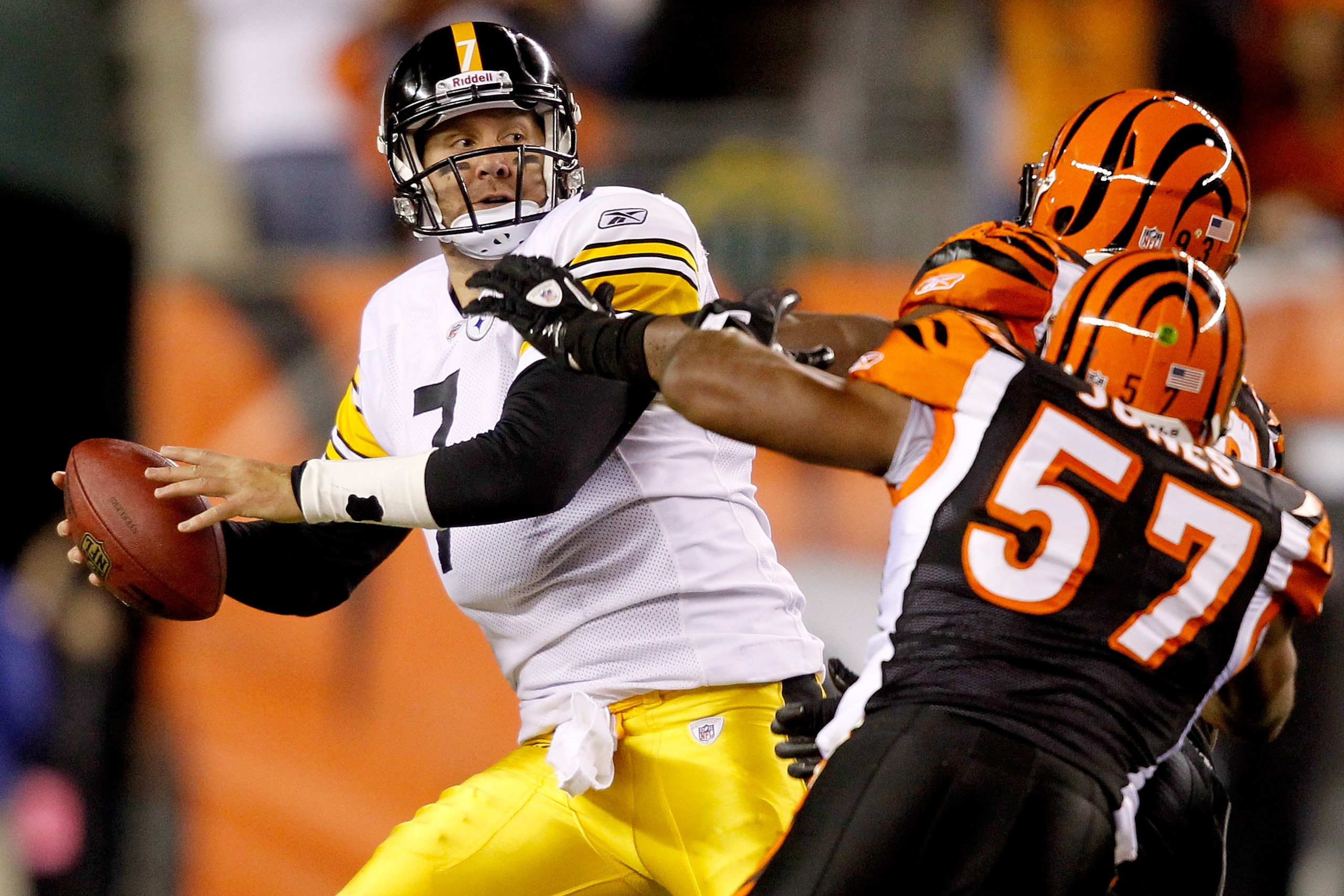 CINCINNATI - NOVEMBER 08:  Quarterback Ben Roethlisberger #7 of the Pittsburgh Steelers throws under pressure while playing the Cincinnati Bengals at Paul Brown Stadium on November 8, 2010 in Cincinnati, Ohio.  The Steelers defeated the Bengals 27-21. (Ph