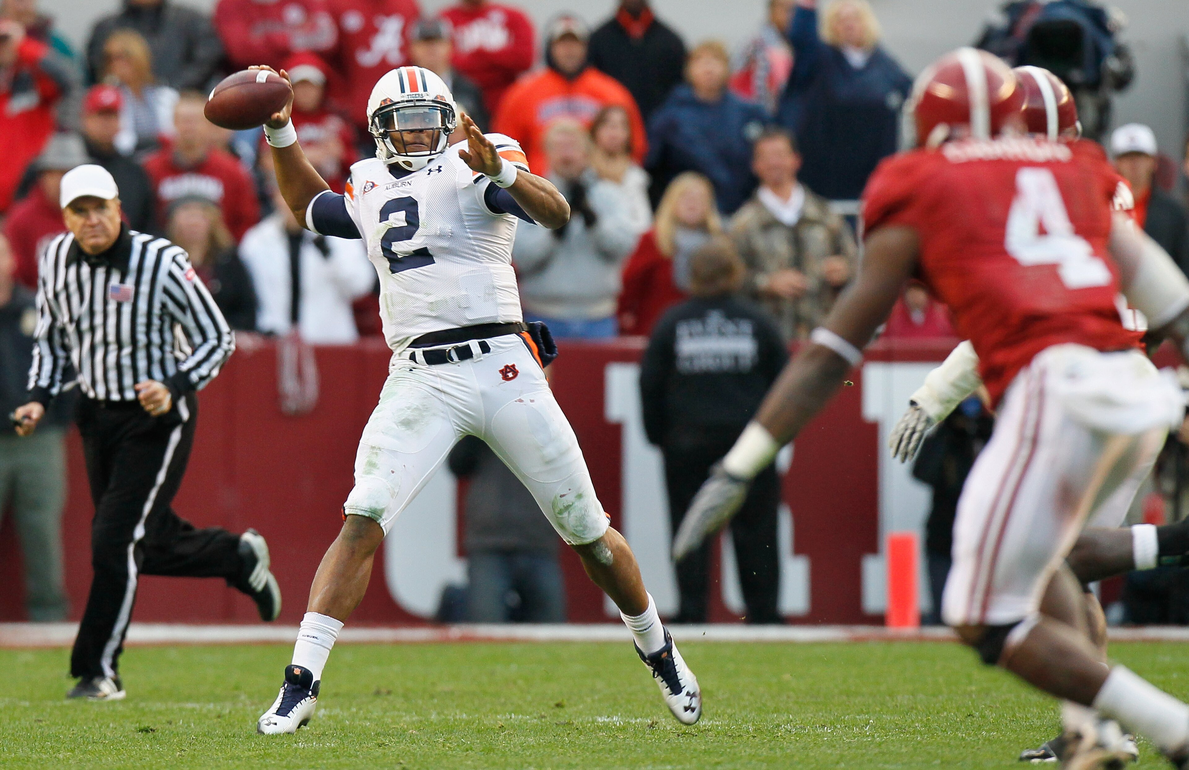 TUSCALOOSA, AL - NOVEMBER 26:  Quarterback Cam Newton #2 of the Auburn Tigers looks to pass against the Alabama Crimson Tide at Bryant-Denny Stadium on November 26, 2010 in Tuscaloosa, Alabama.  (Photo by Kevin C. Cox/Getty Images)