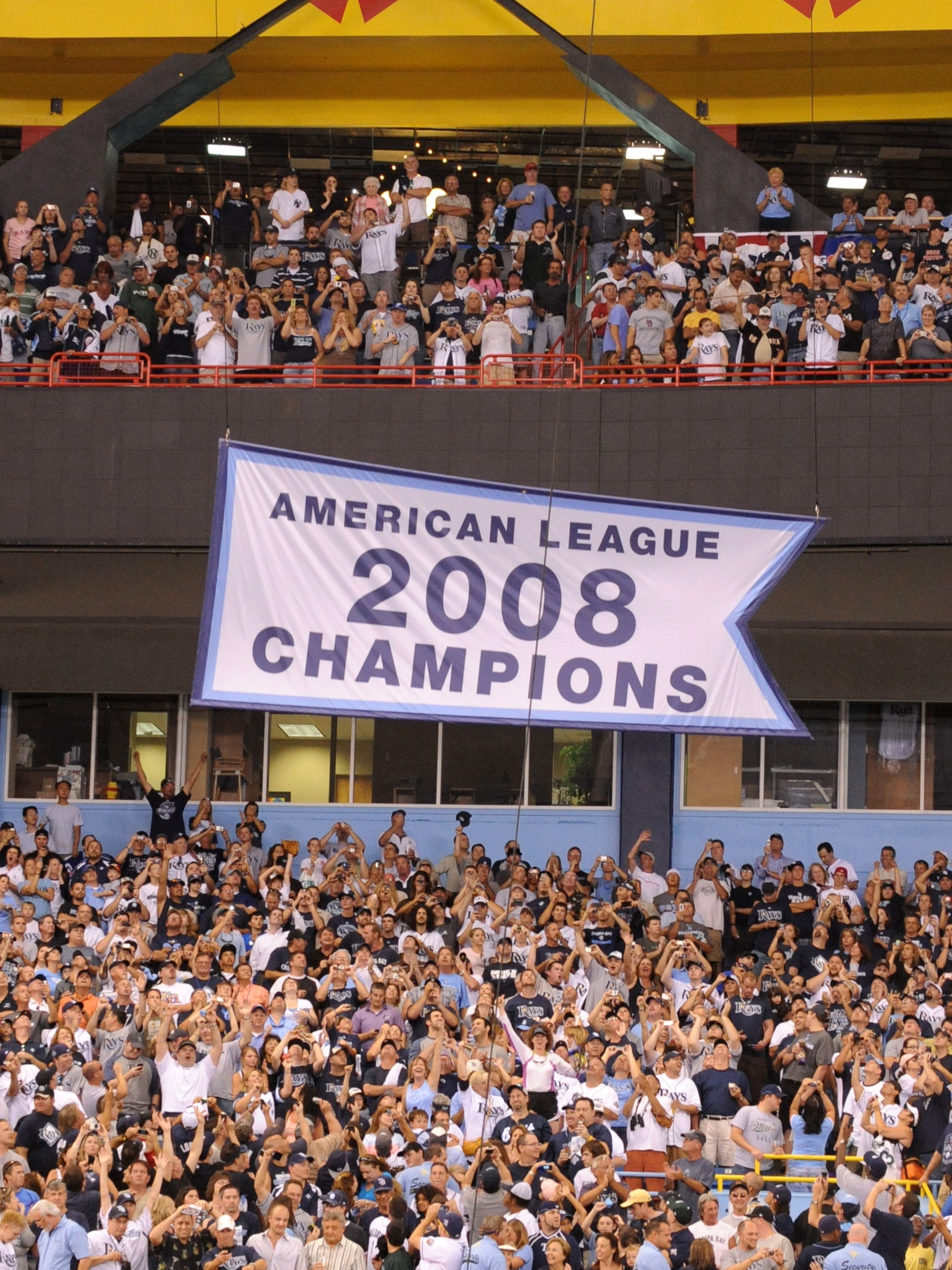 ST. PETERSBURG, FL - APRIL 13: The Tampa Bay Rays hang an AL 2008 championship banner before play against the New York Yankees on April 13, 2009 at Tropicana Field in St. Petersburg, Florida. (Photo by Al Messerschmidt/Getty Images) ST. PETERSBURG, FL - APRIL 13: The Tampa Bay Rays hang an AL 2008 championship banner before play against the New York Yankees on April 13, 2009 at Tropicana Field in St. Petersburg, Florida. (Photo by Al Messerschmidt/Getty Images)