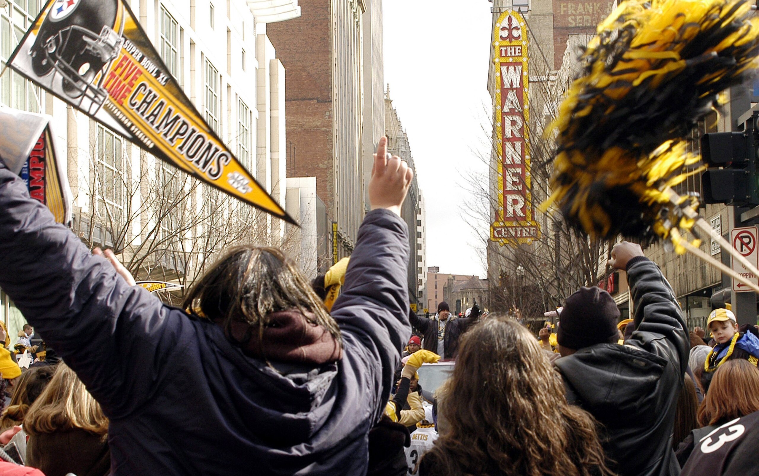 PITTSBURGH - FEBRUARY 7:  Pittsburgh Steelers quarterback Ben Roethlisberger waves to the crowd of over an estimated 250,000 during the victory parade celebrating the win at Super Bowl XL on February 7, 2006 in downtown Pittsburgh, Pennsylvania.  (Photo b