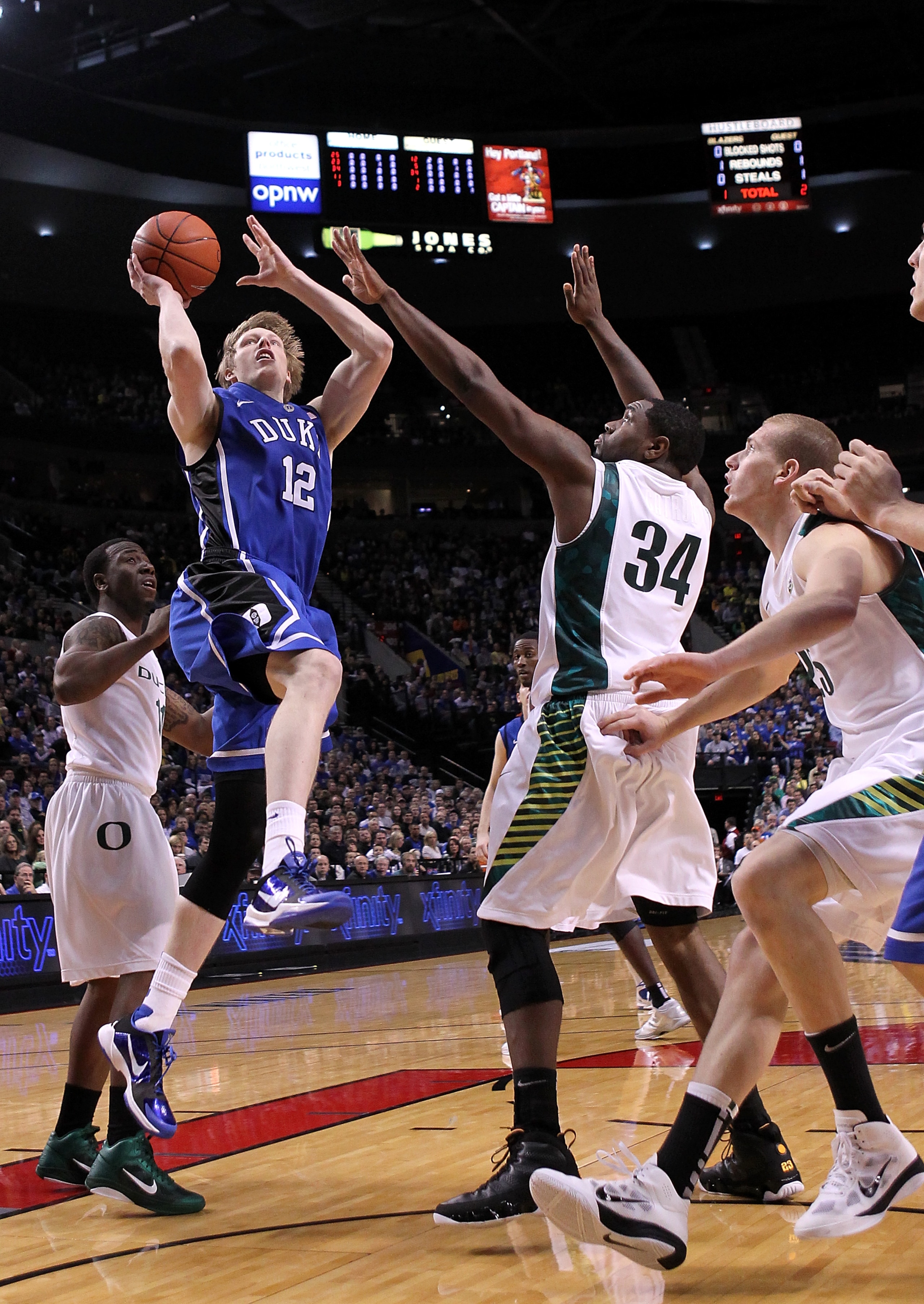 PORTLAND, OR - NOVEMBER 27: Kyle Singler #12 of the Duke Blue Devils shoots against the Oregon Ducks on November 27, 2010 at the Rose Garden in Portland, Oregon. (Photo by Jonathan Ferrey/Getty Images) PORTLAND, OR - NOVEMBER 27: Kyle Singler #12 of the Duke Blue Devils shoots against the Oregon Ducks on November 27, 2010 at the Rose Garden in Portland, Oregon. (Photo by Jonathan Ferrey/Getty Images)