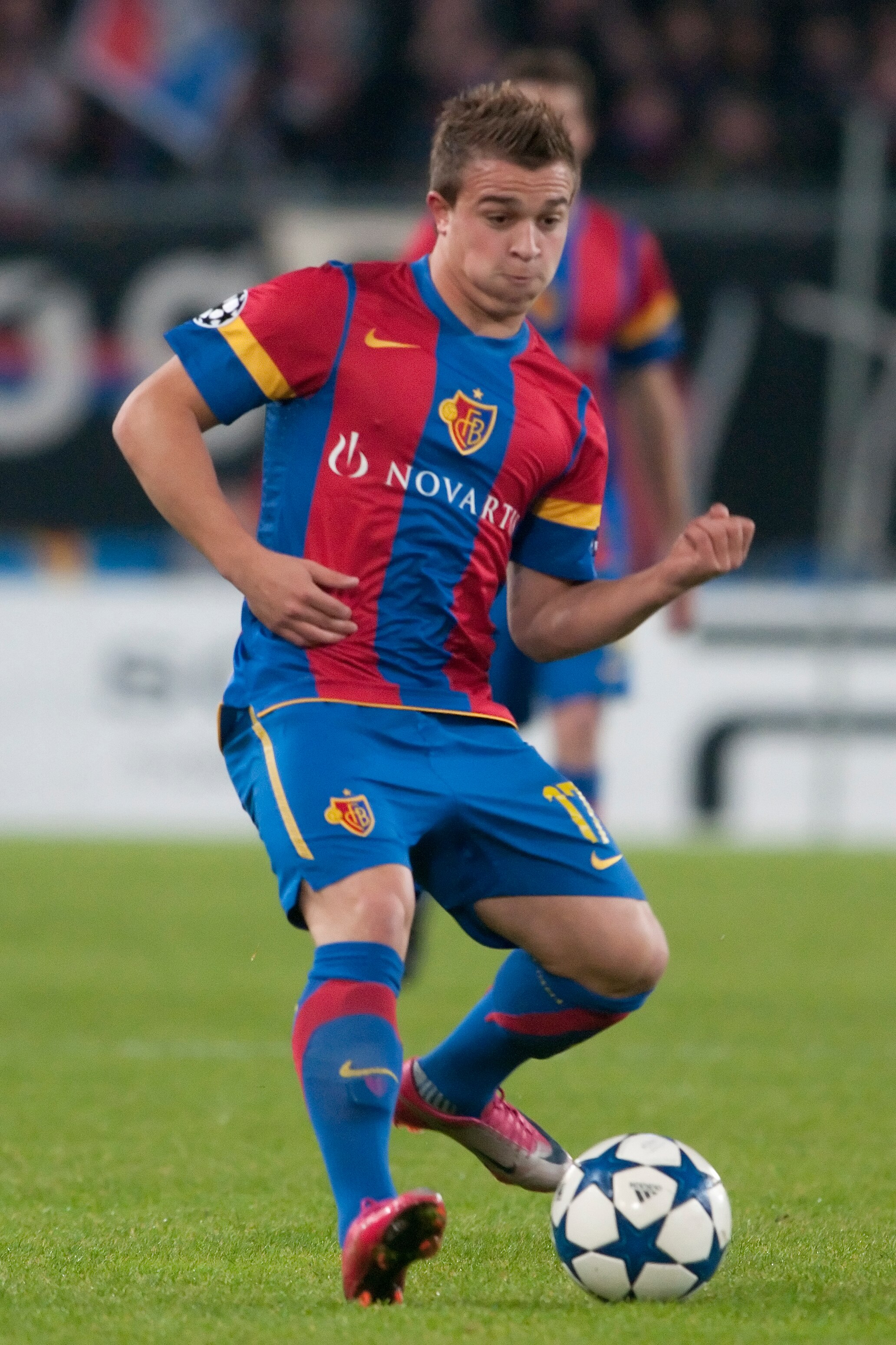 BASEL, SWITZERLAND - NOVEMBER 03:  Xherdan Shaqiri of FC Basel during the UEFA Champions League Group E match between FC Basel and AS Roma at St Jakob-Park Stadium on November 3, 2010 in Basel, Switzerland.  (Photo by Sebastien Bozon/EuroFootball/Getty Im