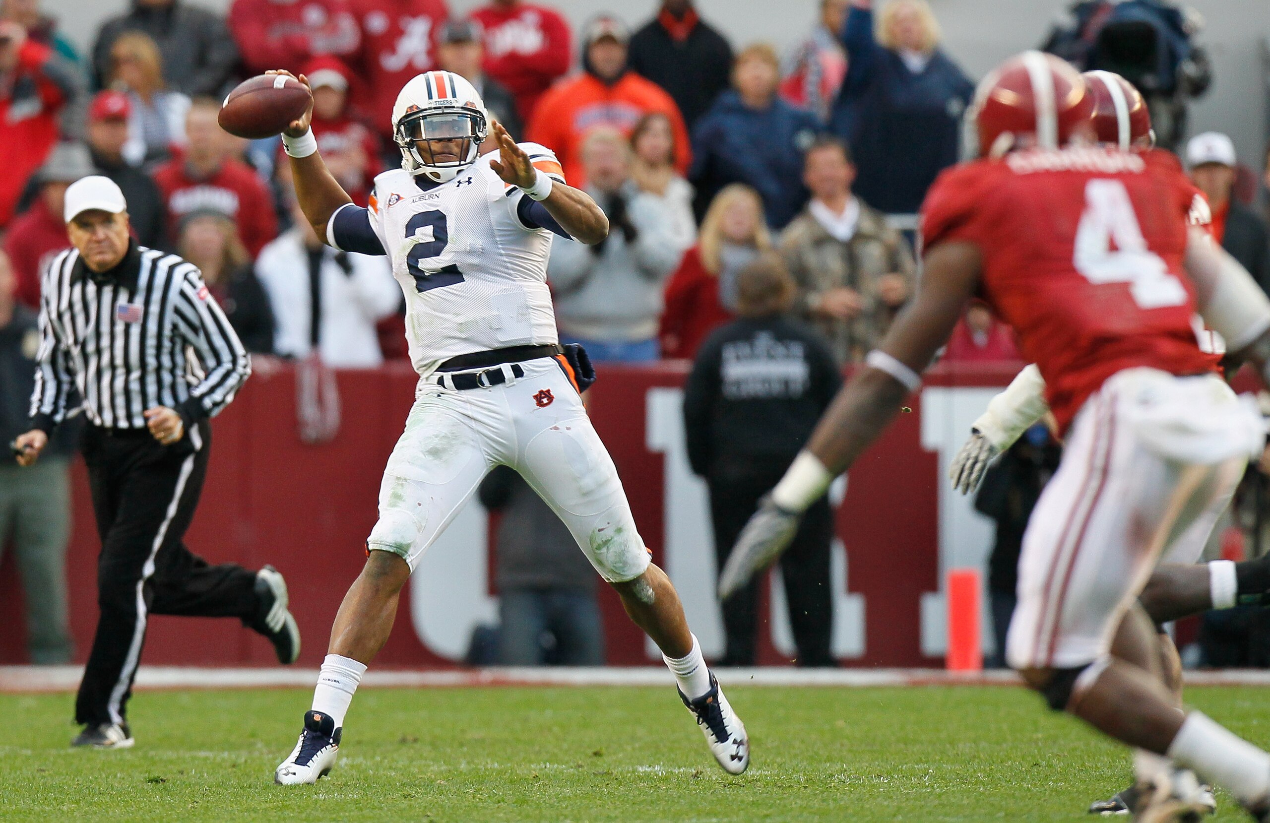 TUSCALOOSA, AL - NOVEMBER 26: Quarterback Cam Newton #2 of the Auburn Tigers looks to pass against the Alabama Crimson Tide at Bryant-Denny Stadium on November 26, 2010 in Tuscaloosa, Alabama. (Photo by Kevin C. Cox/Getty Images) TUSCALOOSA, AL - NOVEMBER 26: Quarterback Cam Newton #2 of the Auburn Tigers looks to pass against the Alabama Crimson Tide at Bryant-Denny Stadium on November 26, 2010 in Tuscaloosa, Alabama. (Photo by Kevin C. Cox/Getty Images)