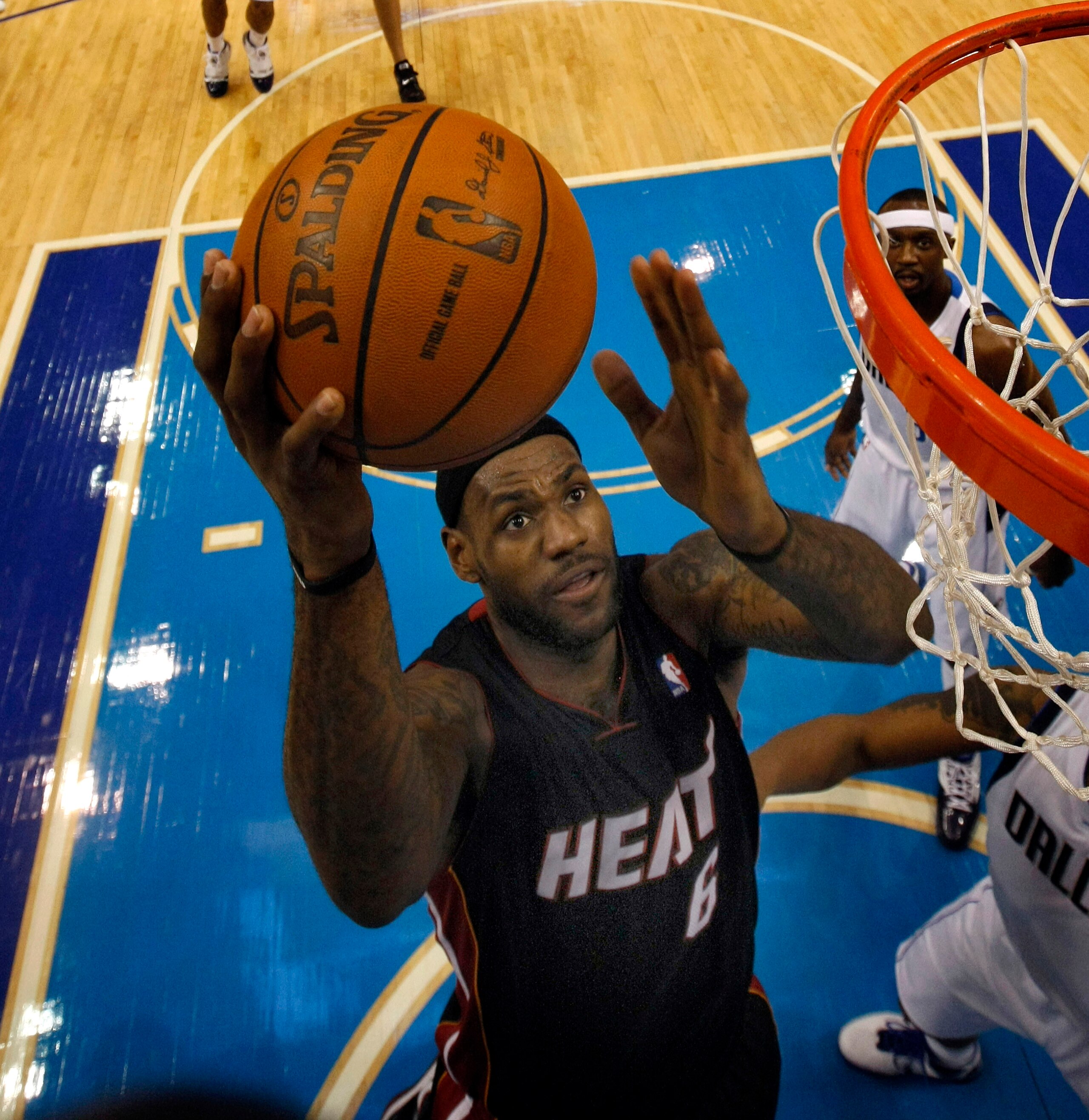 DALLAS - NOVEMBER 27: Lebron James #6 of the Miami Heat shoots against the Dallas Mavericks on November 27, 2010 at the American Airlines Center in Dallas, Texas. NOTE TO USER: User expressly acknowledges and agrees that, by downloading and or using this