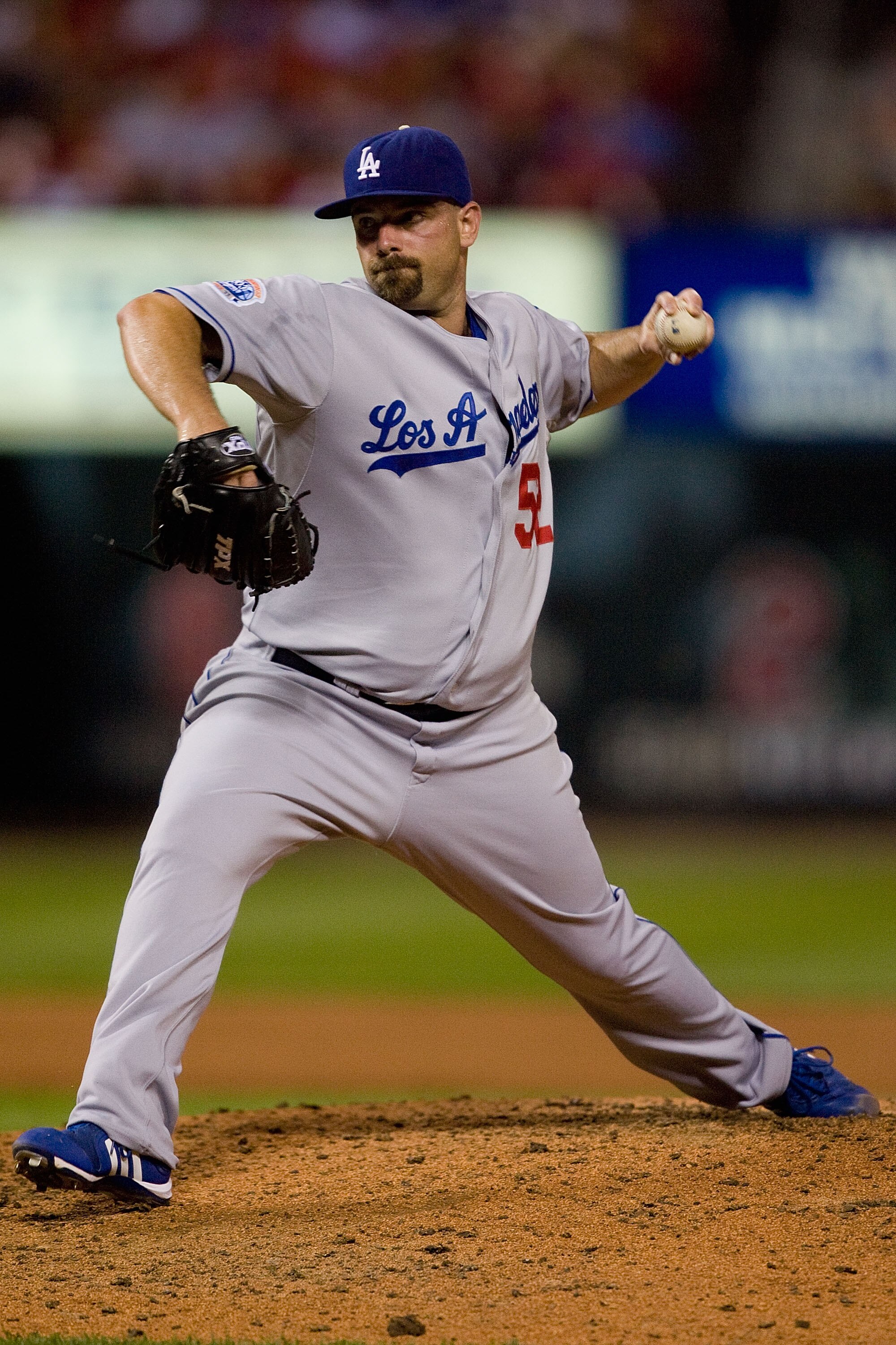 ST. LOUIS - JULY 15: Relief pitcher George Sherill #52 of the Los Angeles Dodgers throws against the St. Louis Cardinals at Busch Stadium on July 15, 2010 in St. Louis, Missouri.  The Cardinals beat the Dodgers 7-1.  (Photo by Dilip Vishwanat/Getty Images