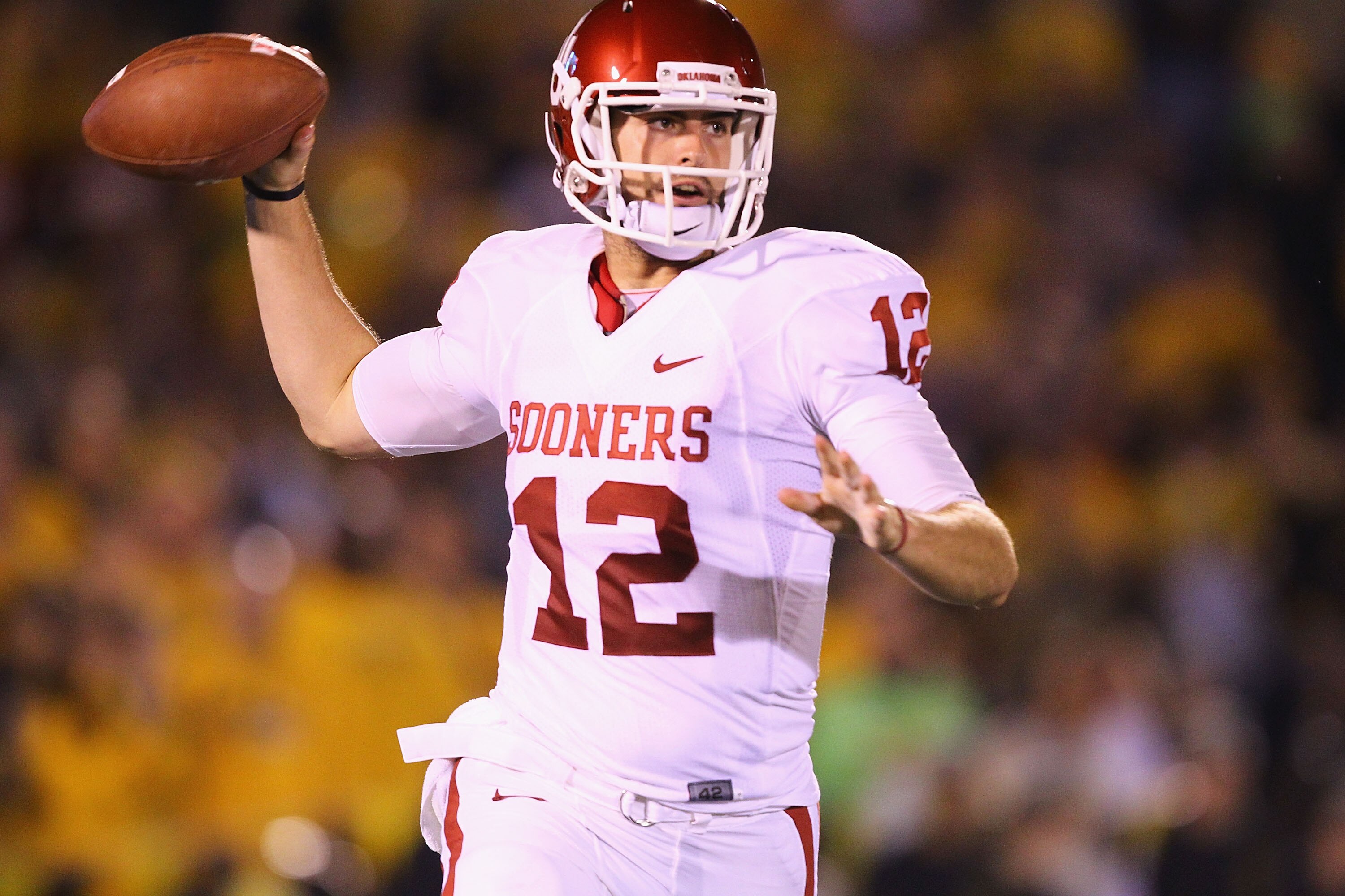 COLUMBIA, MO - OCTOBER 23: Landry Jones #12 of the Oklahoma Sooners in action against the Missouri Tigers at Faurot Field/Memorial Stadium on October 23, 2010 in Columbia, Missouri.  The Tigers beat the Sooners 36-27.  (Photo by Dilip Vishwanat/Getty Imag