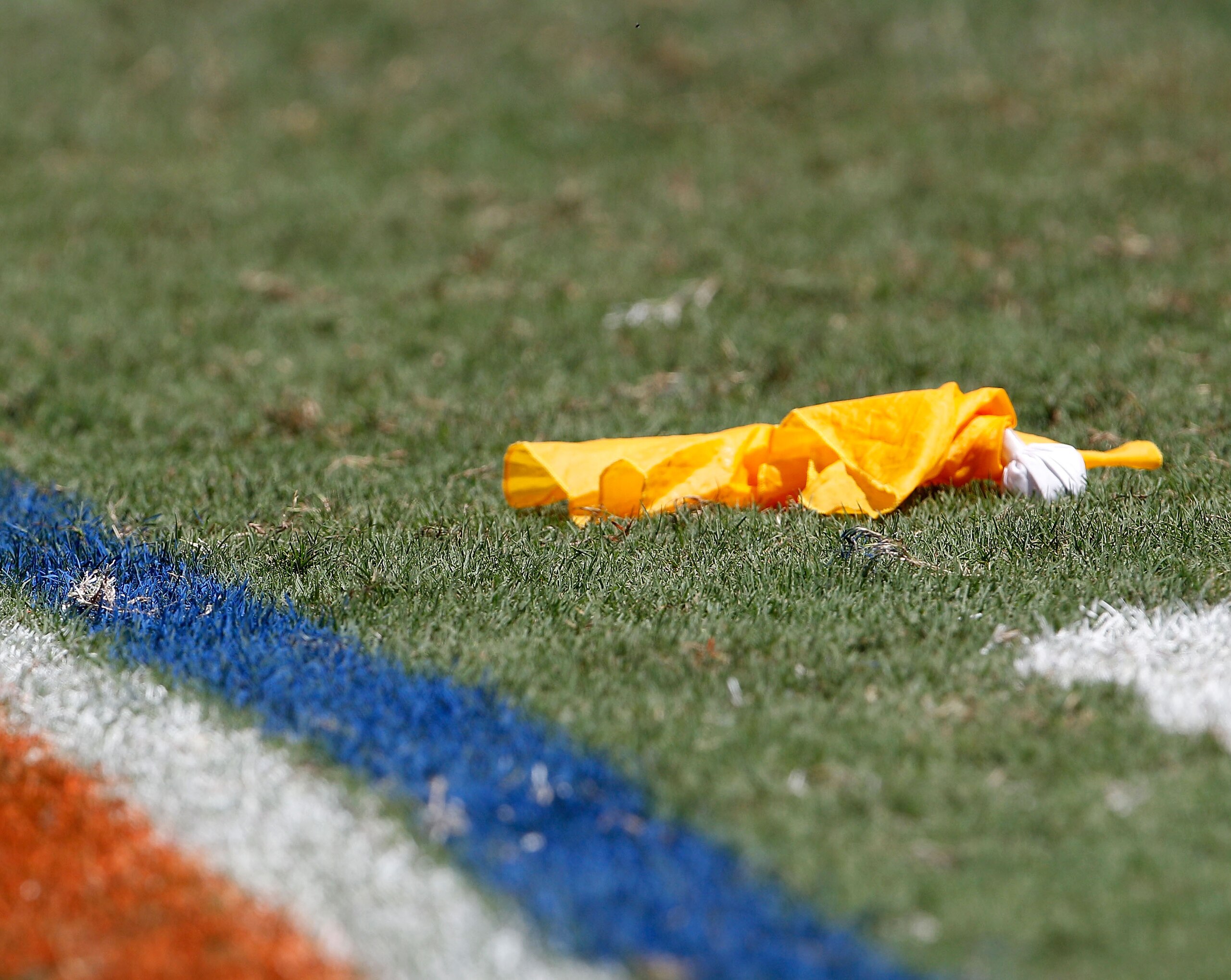 GAINESVILLE, FL - SEPTEMBER 11: A penalty flag lies on the field during a game between the South Florida Bulls and the Florida Gators at Ben Hill Griffin Stadium on September 11, 2010 in Gainesville, Florida. (Photo by Sam Greenwood/Getty Images) GAINESVILLE, FL - SEPTEMBER 11: A penalty flag lies on the field during a game between the South Florida Bulls and the Florida Gators at Ben Hill Griffin Stadium on September 11, 2010 in Gainesville, Florida. (Photo by Sam Greenwood/Getty Images)