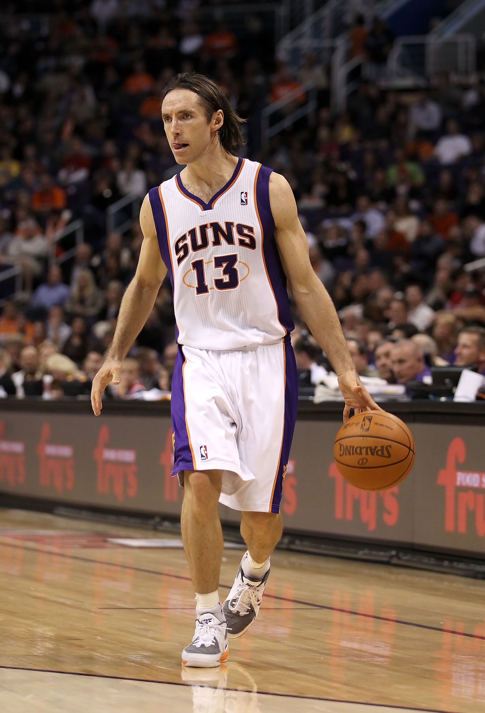 PHOENIX - NOVEMBER 24:  Steve Nash #13 of the Phoenix Suns handles the ball during the NBA game against the Chicago Bulls at US Airways Center on November 24, 2010 in Phoenix, Arizona. The Bulls defeated the Suns 123-115 in double overtime. NOTE TO USER: