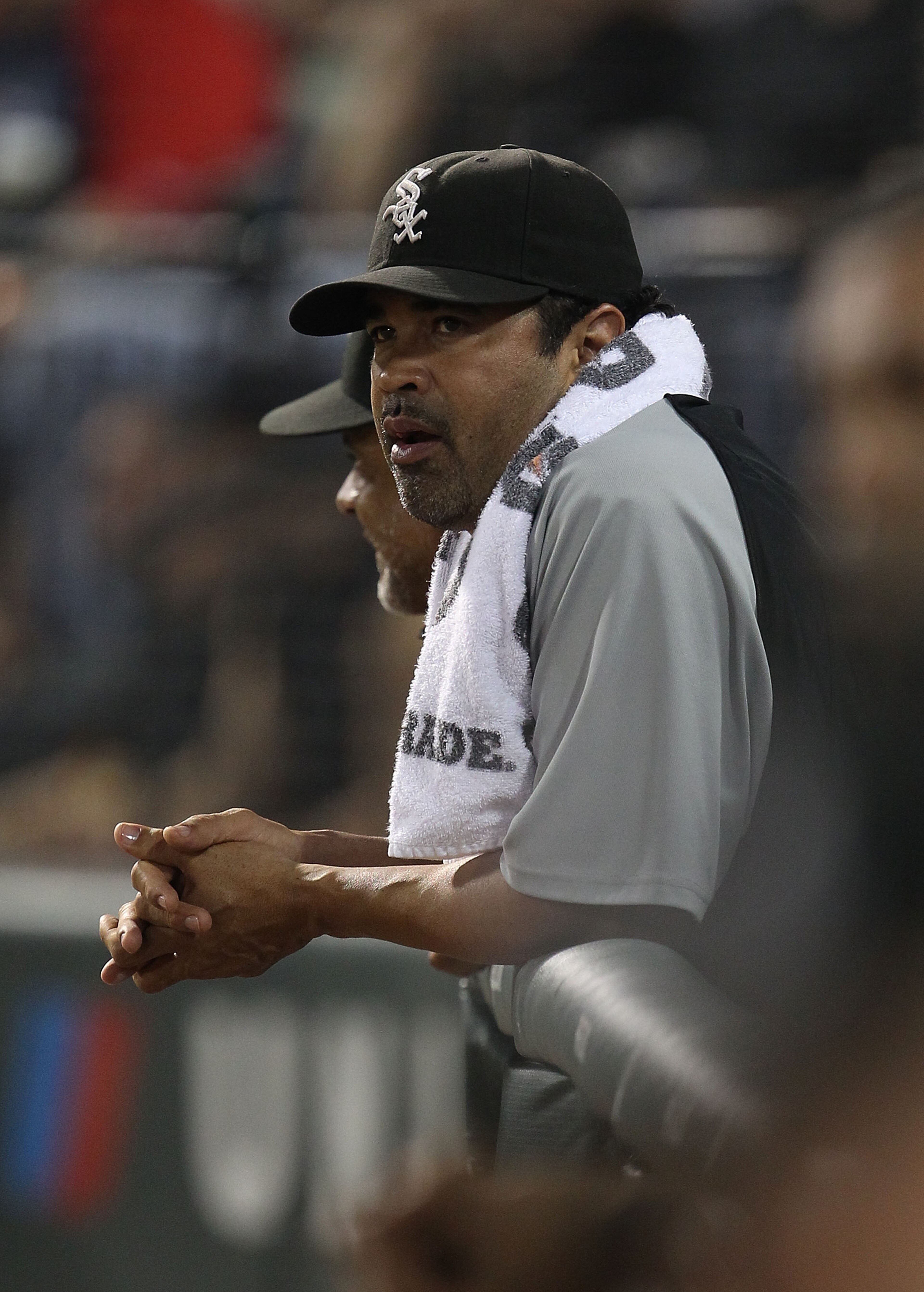 CHICAGO - AUGUST 10: Manager Ozzie Guillen #13 of the Chicago White Sox watches as his team takes on the Minnesota Twins at U.S. Cellular Field on August 10, 2010 in Chicago, Illinois. The Twins defeated the White Sox 12-6. (Photo by Jonathan Daniel/Getty