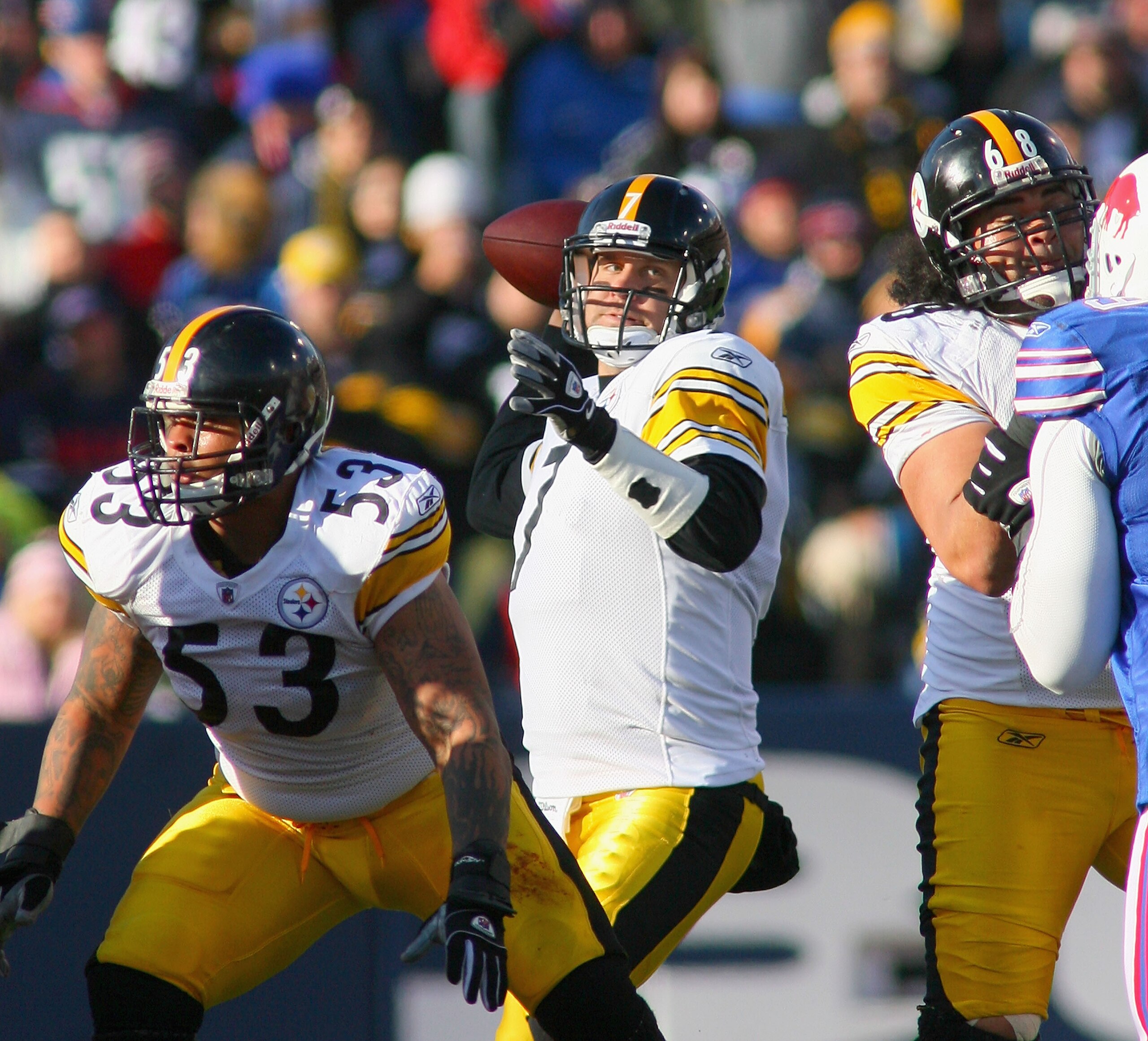 ORCHARD PARK, NY - NOVEMBER 28:  Ben Roethlisberger #7 of the Pittsburgh Steelers throws with protection from Maurkice Pouncey #53 and Chris Kemoteatu #68  against the Buffalo Bills at Ralph Wilson Stadium at Ralph Wilson Stadium on November 28, 2010 in O