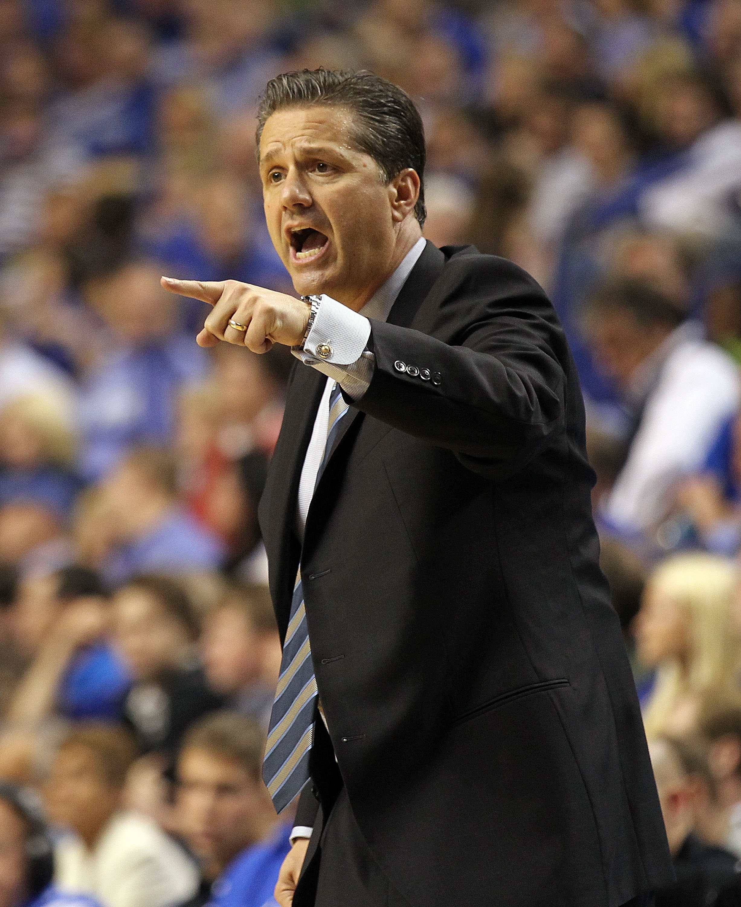 LEXINGTON, KY - NOVEMBER 12:  John Calipari the Head Coach of the Kentucky Wildcats gives   instructions to his team during the game against East Tennessee State Buccaneers at Rupp Arena on November 12, 2010 in Lexington, Kentucky.  (Photo by Andy Lyons/G