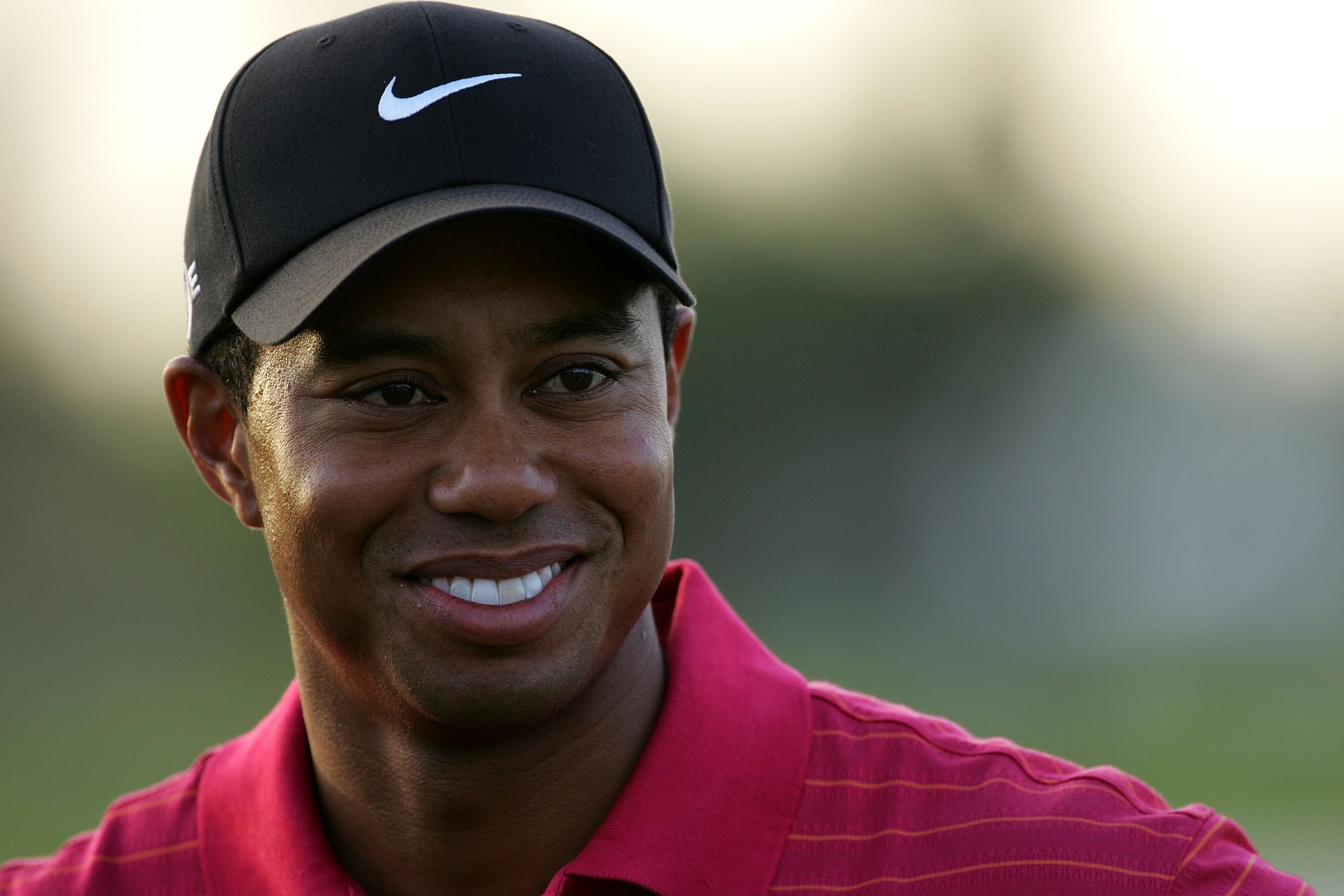 MIAMI - MARCH 25:  Tiger Woods smiles after winning the World Golf Championship CA Championship at the Doral Golf Resort and Spa on March 25, 2006 in Miami, Florida.  (Photo by Andy Lyons/Getty Images)