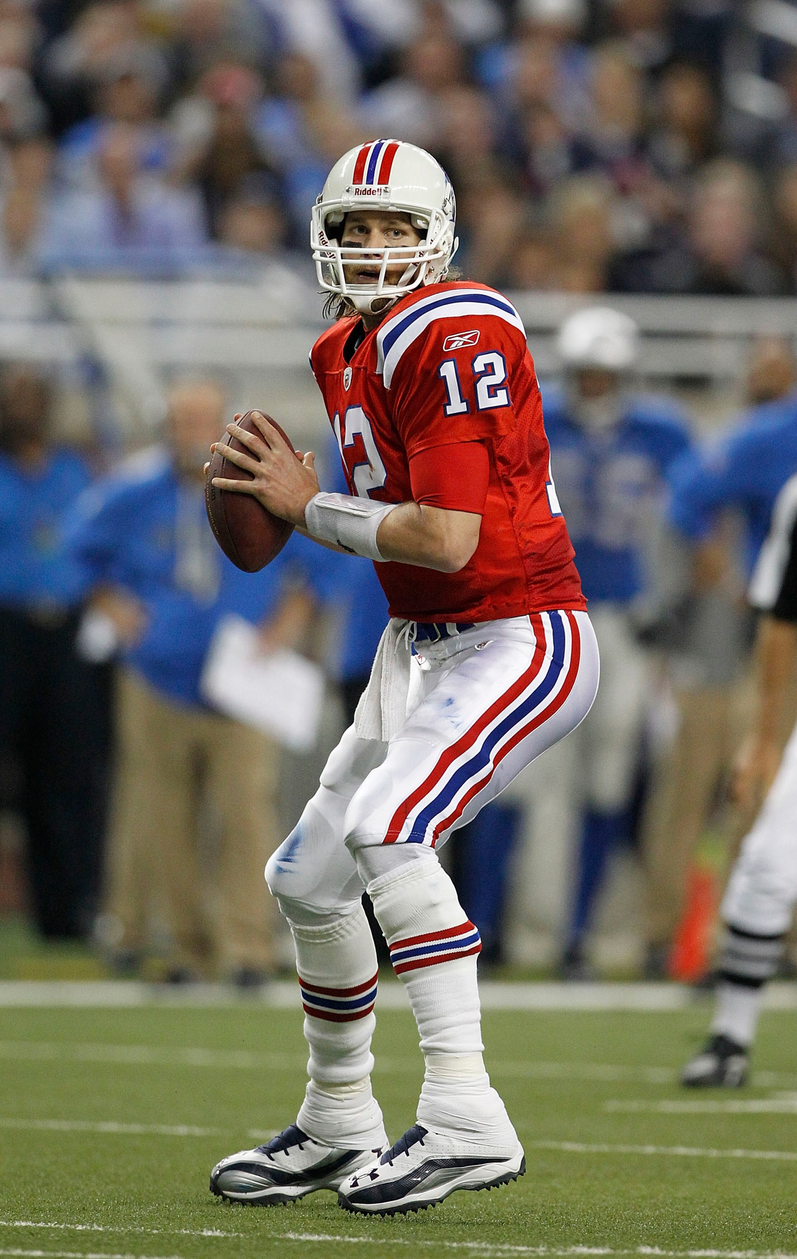 DETROIT - NOVEMBER 25: Tom Brady #12 of the New England Patriots drops back to pass during the game against the Detroit Lions at Ford Field on November 25, 2010 in Detroit, Michigan. New England defeated Detroit 45-24. (Photo by Leon Halip/Getty Images) DETROIT - NOVEMBER 25: Tom Brady #12 of the New England Patriots drops back to pass during the game against the Detroit Lions at Ford Field on November 25, 2010 in Detroit, Michigan. New England defeated Detroit 45-24. (Photo by Leon Halip/Getty Images)
