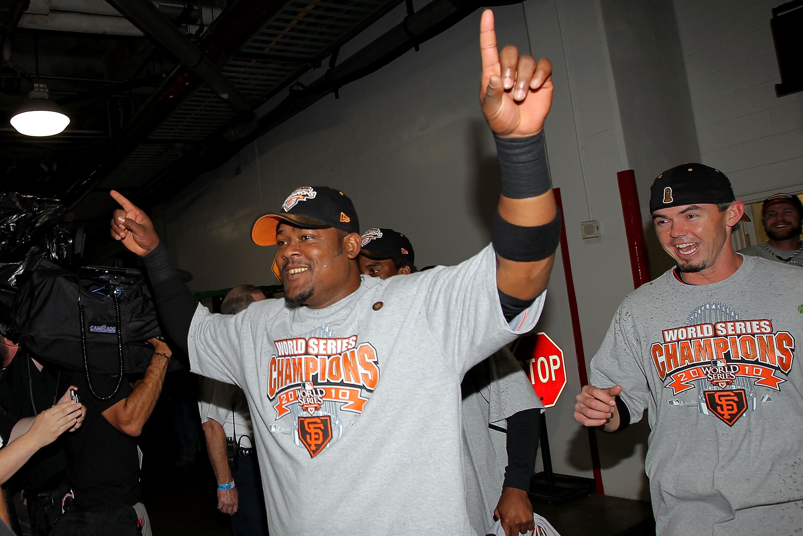 ARLINGTON, TX - NOVEMBER 01:  Juan Uribe #5 of the San Francisco Giants celebrates as he walks to the locker room after they won 3-1 against the Texas Rangers in Game Five of the 2010 MLB World Series at Rangers Ballpark in Arlington on November 1, 2010 i