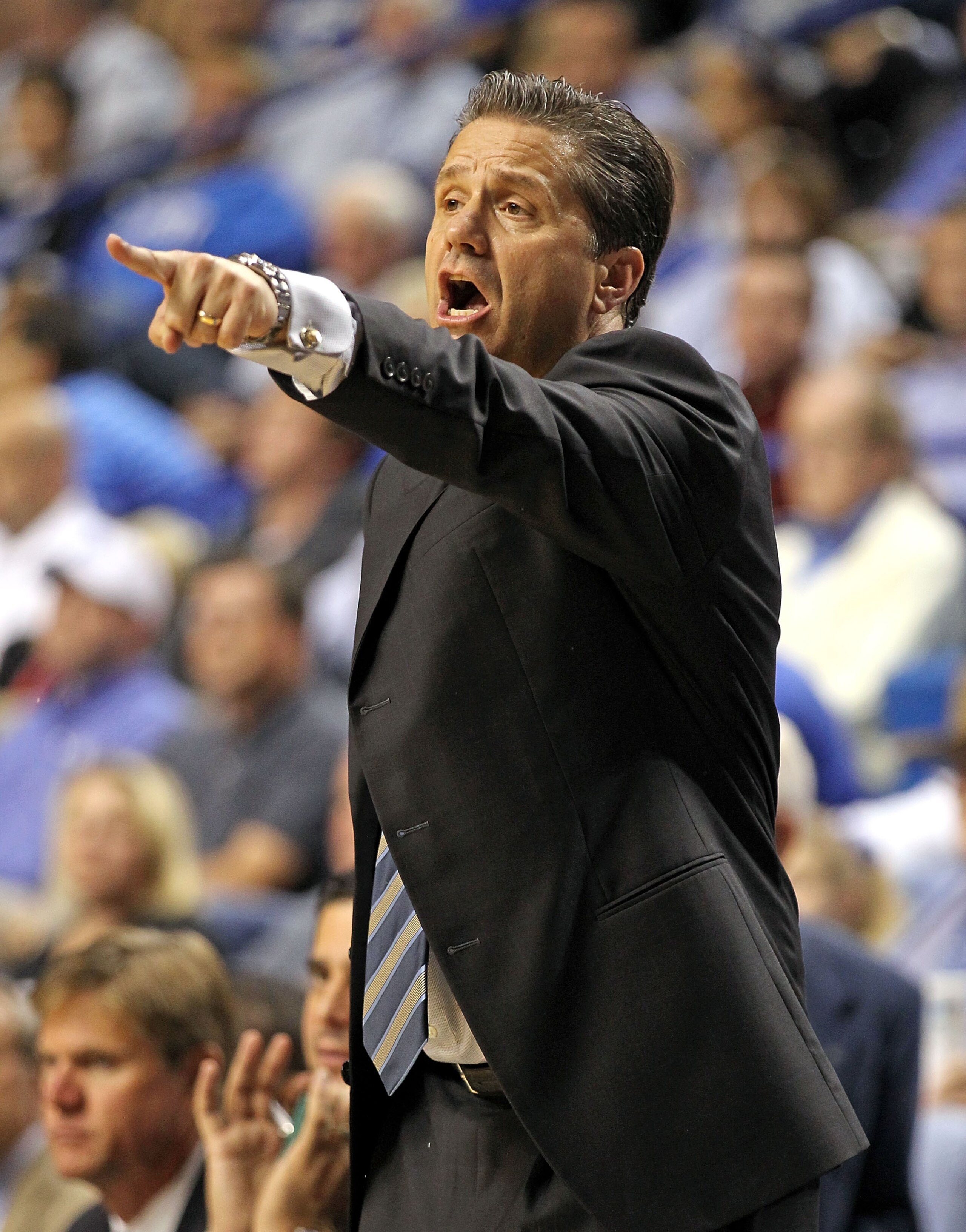 LEXINGTON, KY - NOVEMBER 12:  John Calipari the Head Coach of the Kentucky Wildcats gives   instructions to his team during the game against East Tennessee State Buccaneers at Rupp Arena on November 12, 2010 in Lexington, Kentucky.  (Photo by Andy Lyons/G