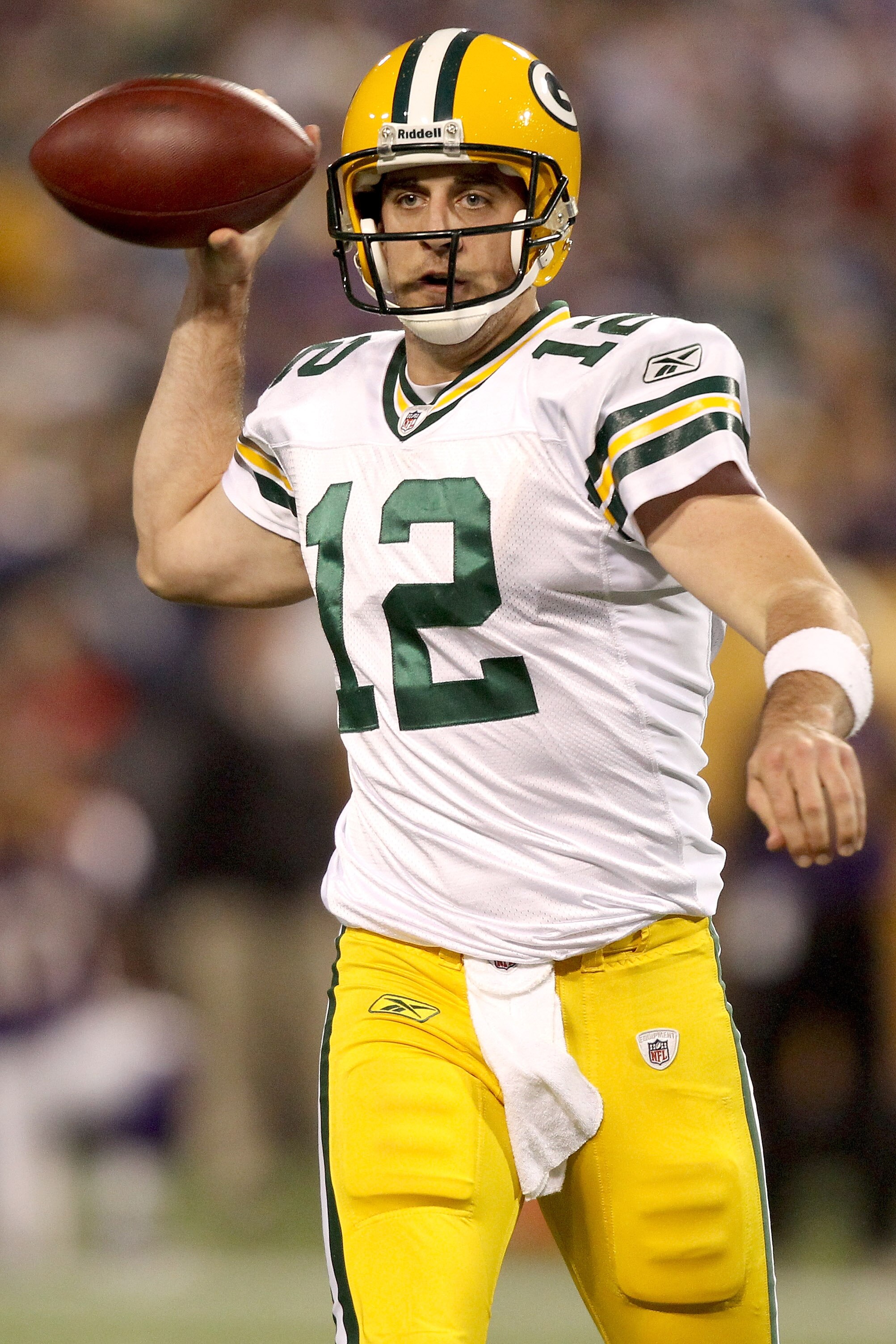 MINNEAPOLIS - NOVEMBER 21:  Quarterback Aaron Rodgers #12 of the Green Bay Packers throws against the Minnesota Vikings at the Hubert H. Humphrey Metrodome on November 21, 2010 in Minneapolis, Minnesota.  (Photo by Matthew Stockman/Getty Images)