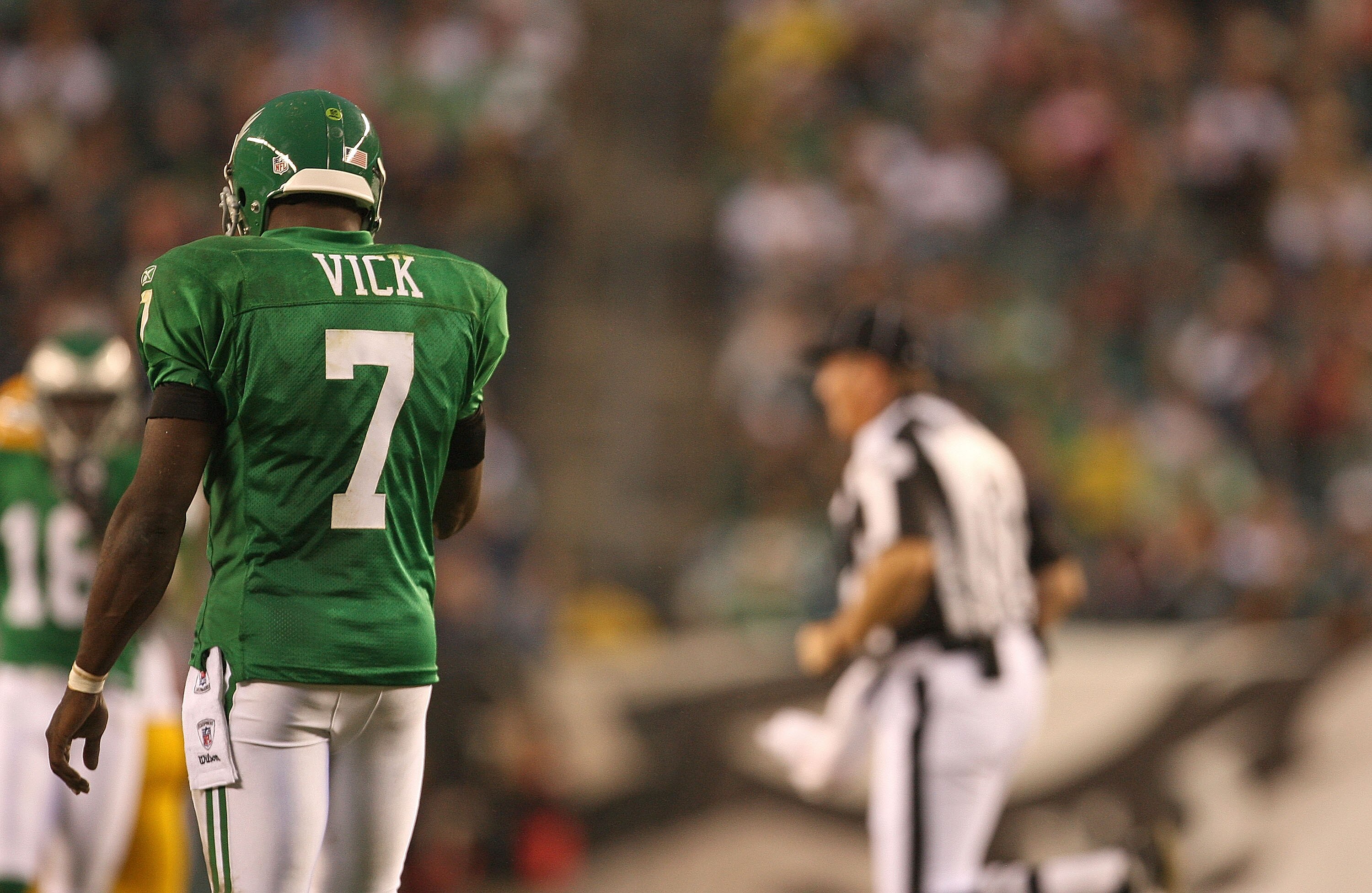 PHILADELPHIA - SEPTEMBER 12:  Michael Vick #7 of the Philadelphia Eagles walks to the sidelines during a game against the Green Bay Packers at Lincoln Financial Field on September 12, 2010 in Philadelphia, Pennsylvania.  (Photo by Mike Ehrmann/Getty Image