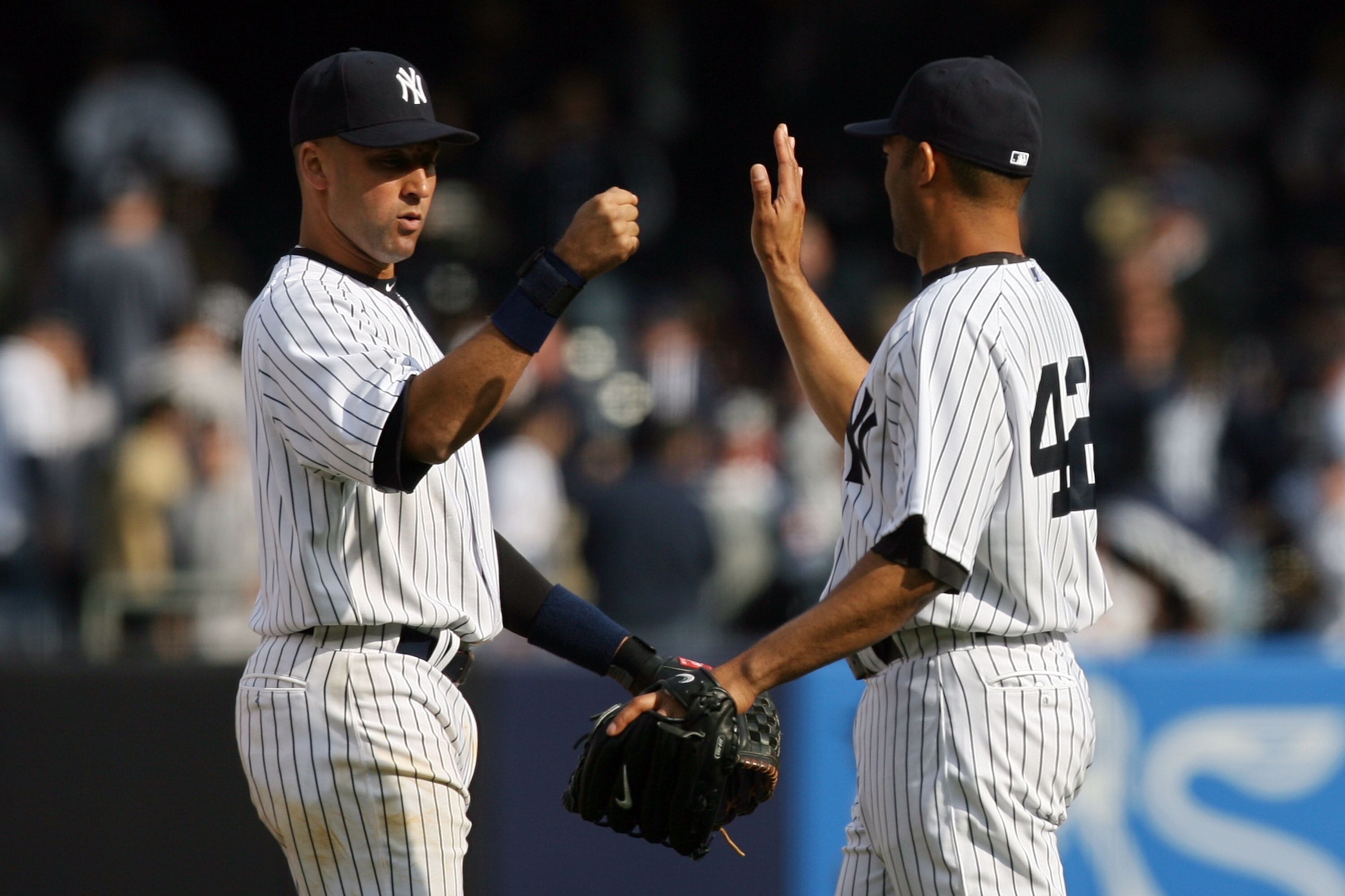 NEW YORK - APRIL 13: Derek Jeter #2 and Mariano Rivera #42 of the New York Yankees celebrate after defeating the Los Angeles Angels of Anaheim during the Yankees home opener at Yankee Stadium on April 13, 2010 in the Bronx borough of New York City. (Pho NEW YORK - APRIL 13: Derek Jeter #2 and Mariano Rivera #42 of the New York Yankees celebrate after defeating the Los Angeles Angels of Anaheim during the Yankees home opener at Yankee Stadium on April 13, 2010 in the Bronx borough of New York City. (Pho