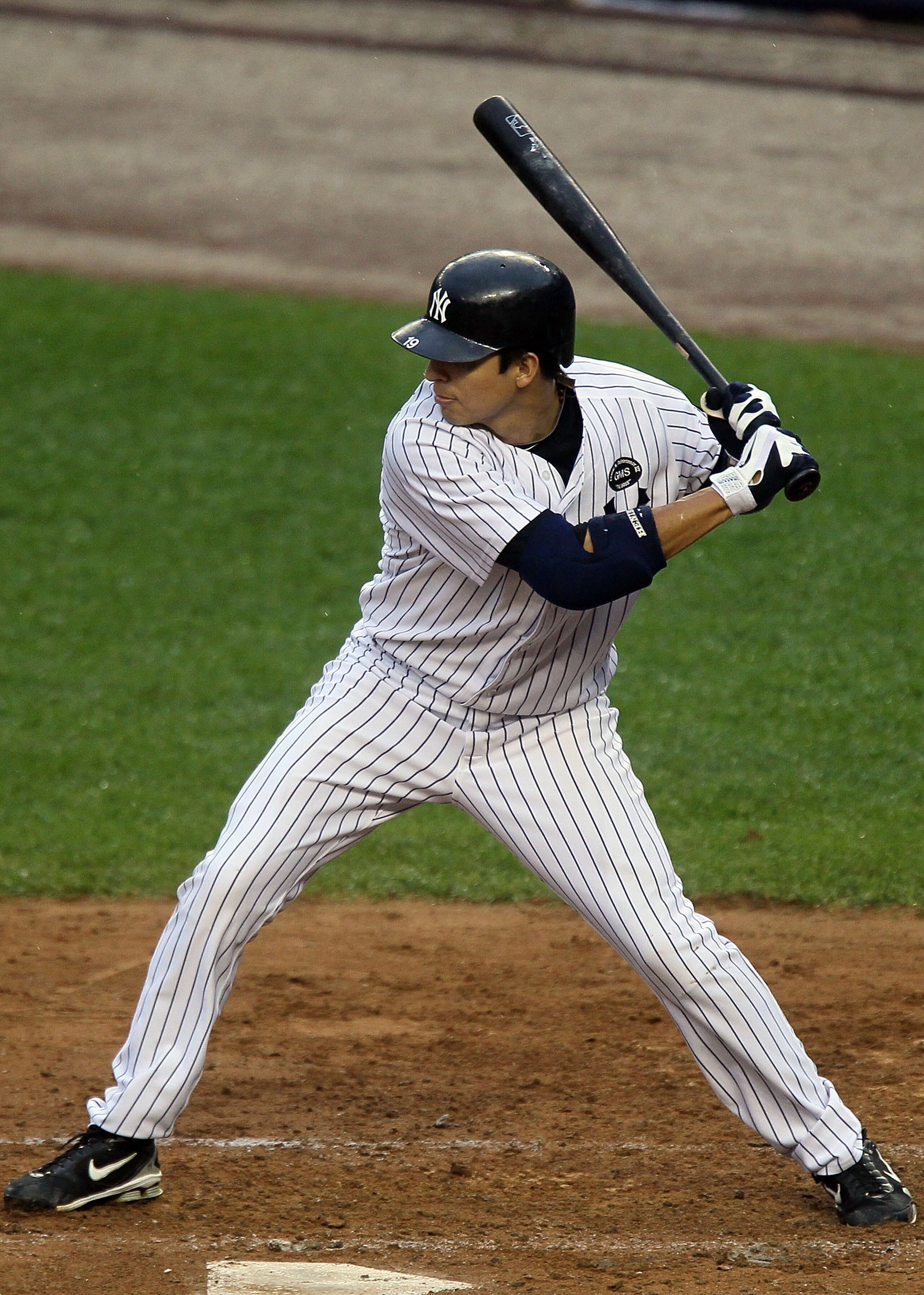 NEW YORK - AUGUST 22:  Ramiro Pena #19 of the New York Yankees bats against the Seattle Mariners on August 22, 2010 at Yankee Stadium in the Bronx borough of New York City.The Yankees defeated the Mariners 10-0.  (Photo by Jim McIsaac/Getty Images)