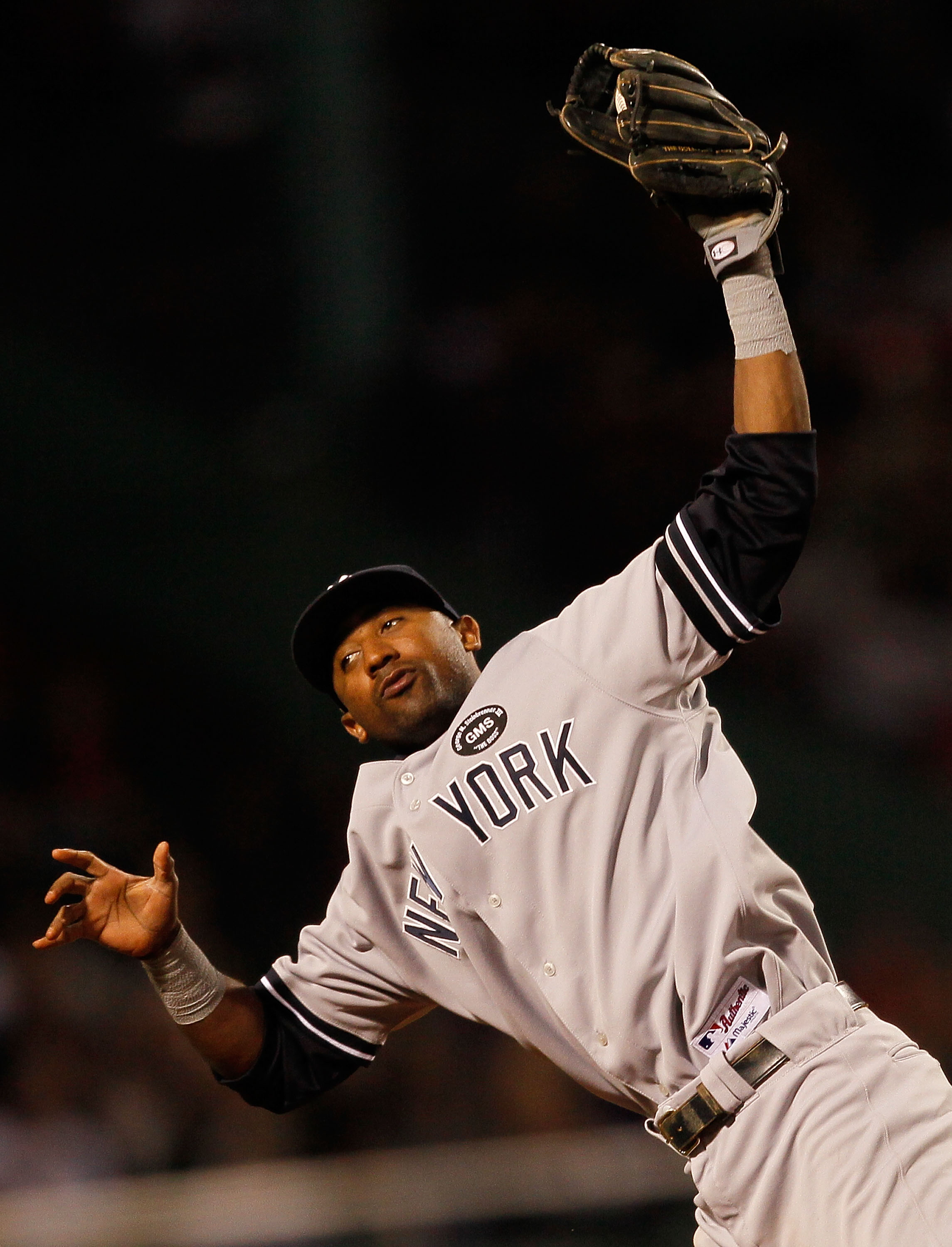BOSTON - OCTOBER 2: Eduardo Nunez #12 of the New York Yankees snags a line drive against the Boston Red Sox in the second game of a doubleheader at Fenway Park, on October 2, 2010, in Boston, Massachusetts. (Photo by Jim Rogash/Getty Images) BOSTON - OCTOBER 2: Eduardo Nunez #12 of the New York Yankees snags a line drive against the Boston Red Sox in the second game of a doubleheader at Fenway Park, on October 2, 2010, in Boston, Massachusetts. (Photo by Jim Rogash/Getty Images)
