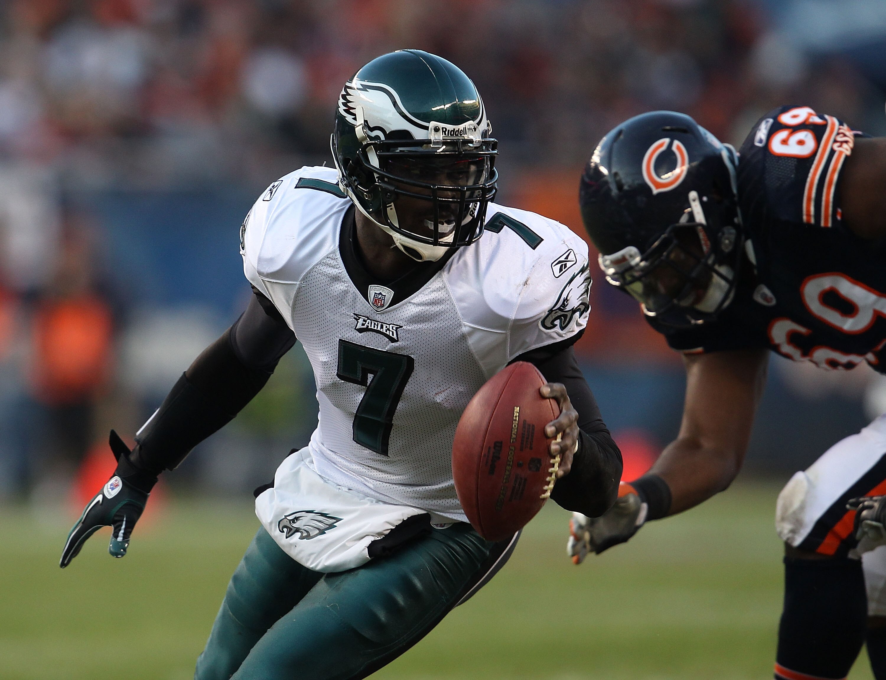 CHICAGO - NOVEMBER 28: Michael Vick #7 of the Philadelphia Eagles turns to avoid a rush by Henry Melton #69 of the Chicago Bears at Soldier Field on November 28, 2010 in Chicago, Illinois. (Photo by Jonathan Daniel/Getty Images)