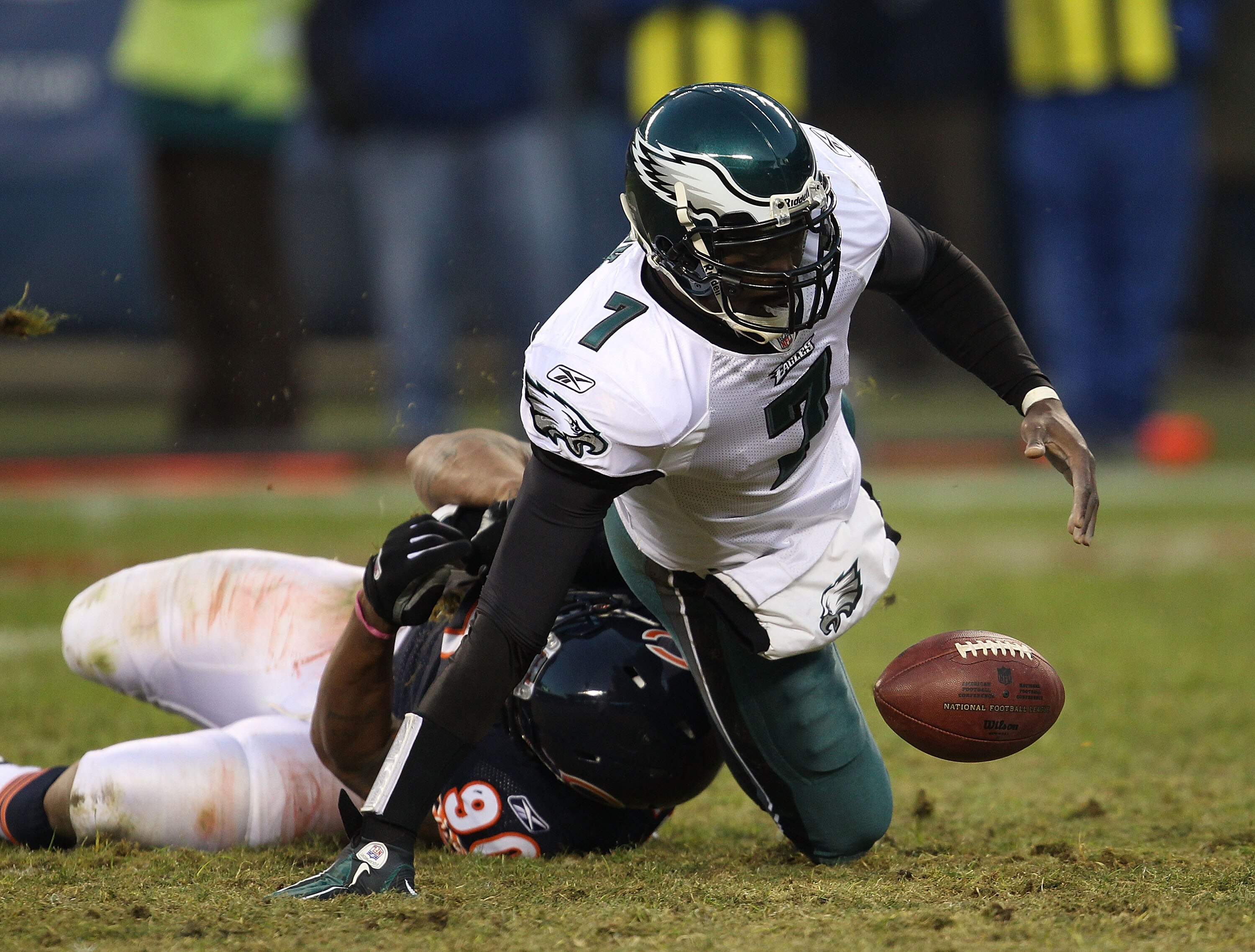 CHICAGO - NOVEMBER 28: Michael Vick #7 of the Philadelphia Eagles fumbles the ball as he is sacked by Julius Peppers #90 of the Chicago Bears at Soldier Field on November 28, 2010 in Chicago, Illinois.  (Photo by Jonathan Daniel/Getty Images)