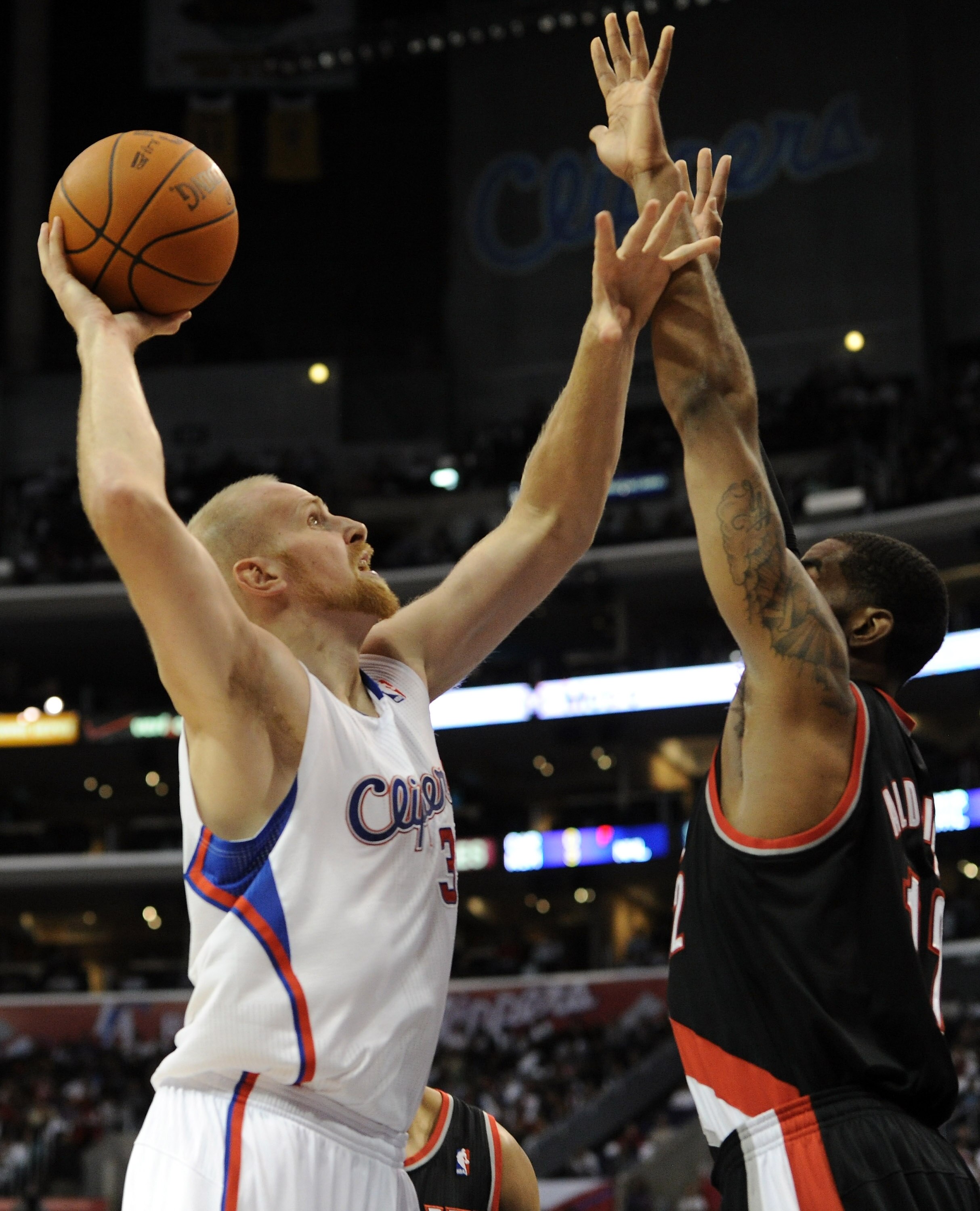LOS ANGELES, CA - OCTOBER 27: Chris Kaman #35 of the Los Angeles Clippers shoots a jump hook over LaMarcus Aldridge #12 of the Portland Trail Blazers at Staples Center on October 27, 2010 in Los Angeles, California. NOTE TO USER: User expressly acknowled LOS ANGELES, CA - OCTOBER 27: Chris Kaman #35 of the Los Angeles Clippers shoots a jump hook over LaMarcus Aldridge #12 of the Portland Trail Blazers at Staples Center on October 27, 2010 in Los Angeles, California. NOTE TO USER: User expressly acknowled