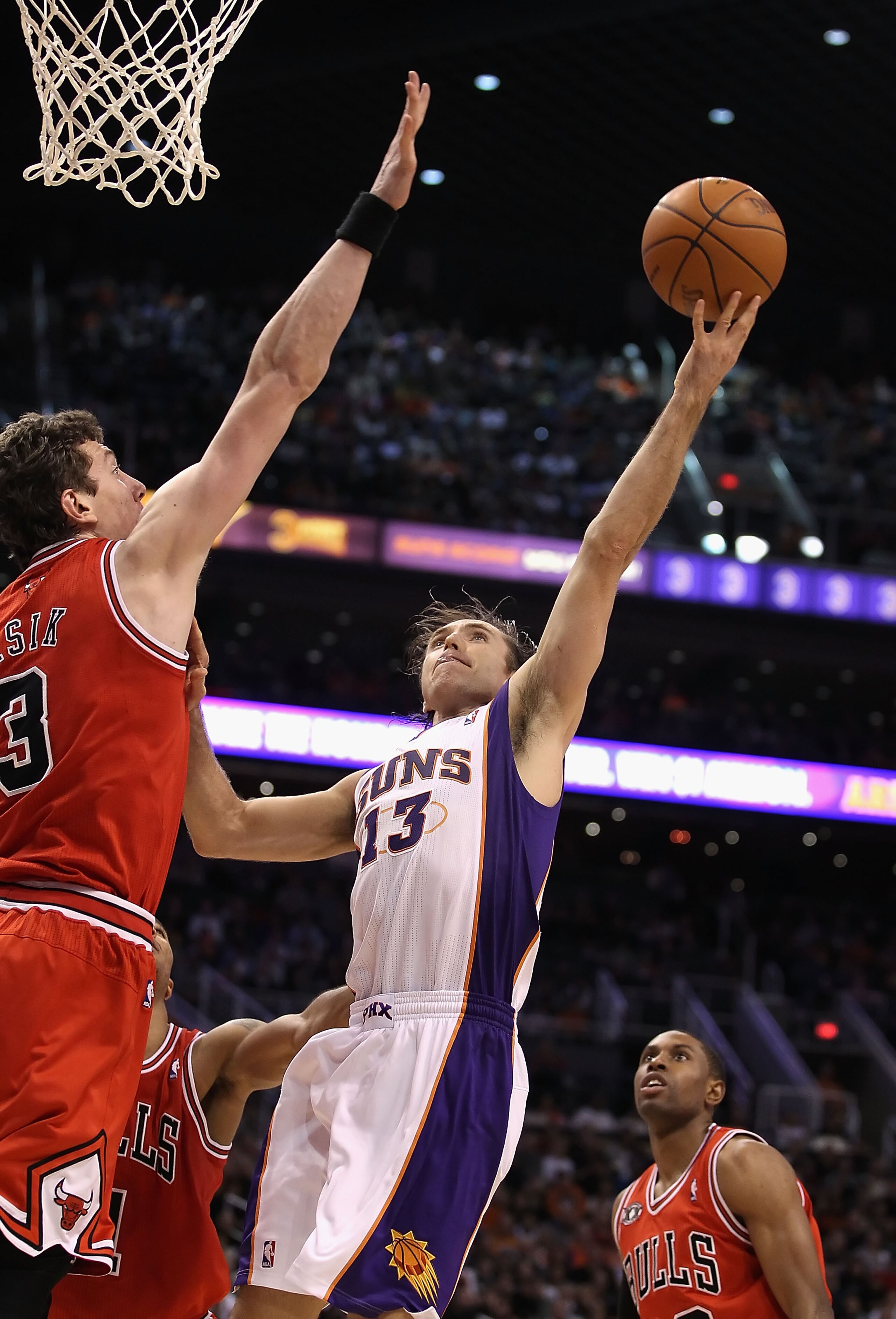 PHOENIX - NOVEMBER 24: Steve Nash #13 of the Phoenix Suns lays up a shot during the NBA game against the Chicago Bulls at US Airways Center on November 24, 2010 in Phoenix, Arizona. NOTE TO USER: User expressly acknowledges and agrees that, by downloadin PHOENIX - NOVEMBER 24: Steve Nash #13 of the Phoenix Suns lays up a shot during the NBA game against the Chicago Bulls at US Airways Center on November 24, 2010 in Phoenix, Arizona. NOTE TO USER: User expressly acknowledges and agrees that, by downloadin